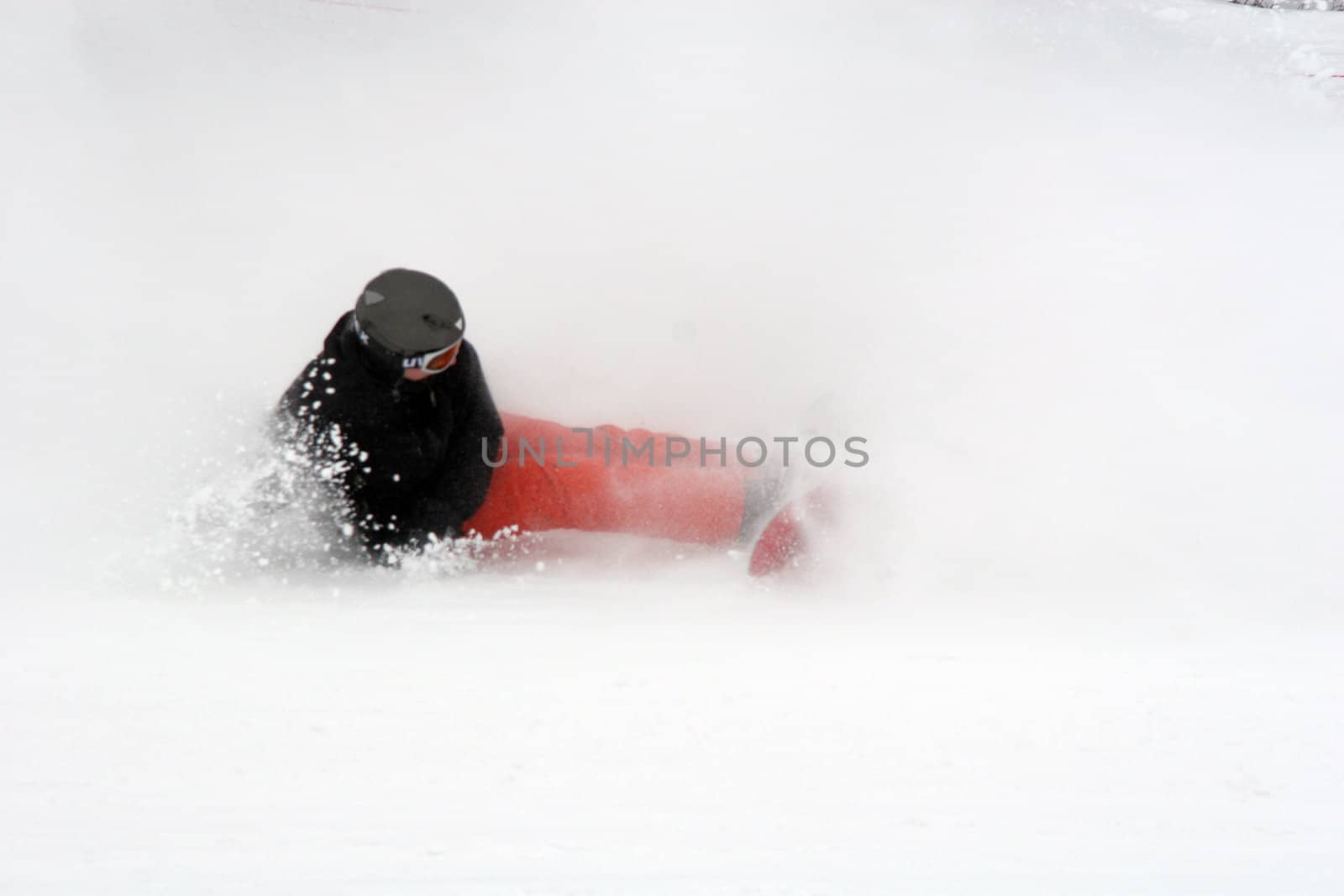 Snowboardman falling