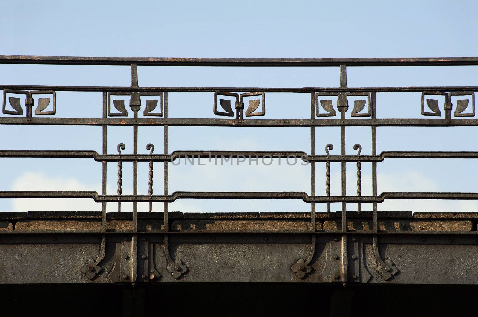 Beautiful wrought-iron Art Nouveau railing on a railway bridge. Hamburg, Germany. 