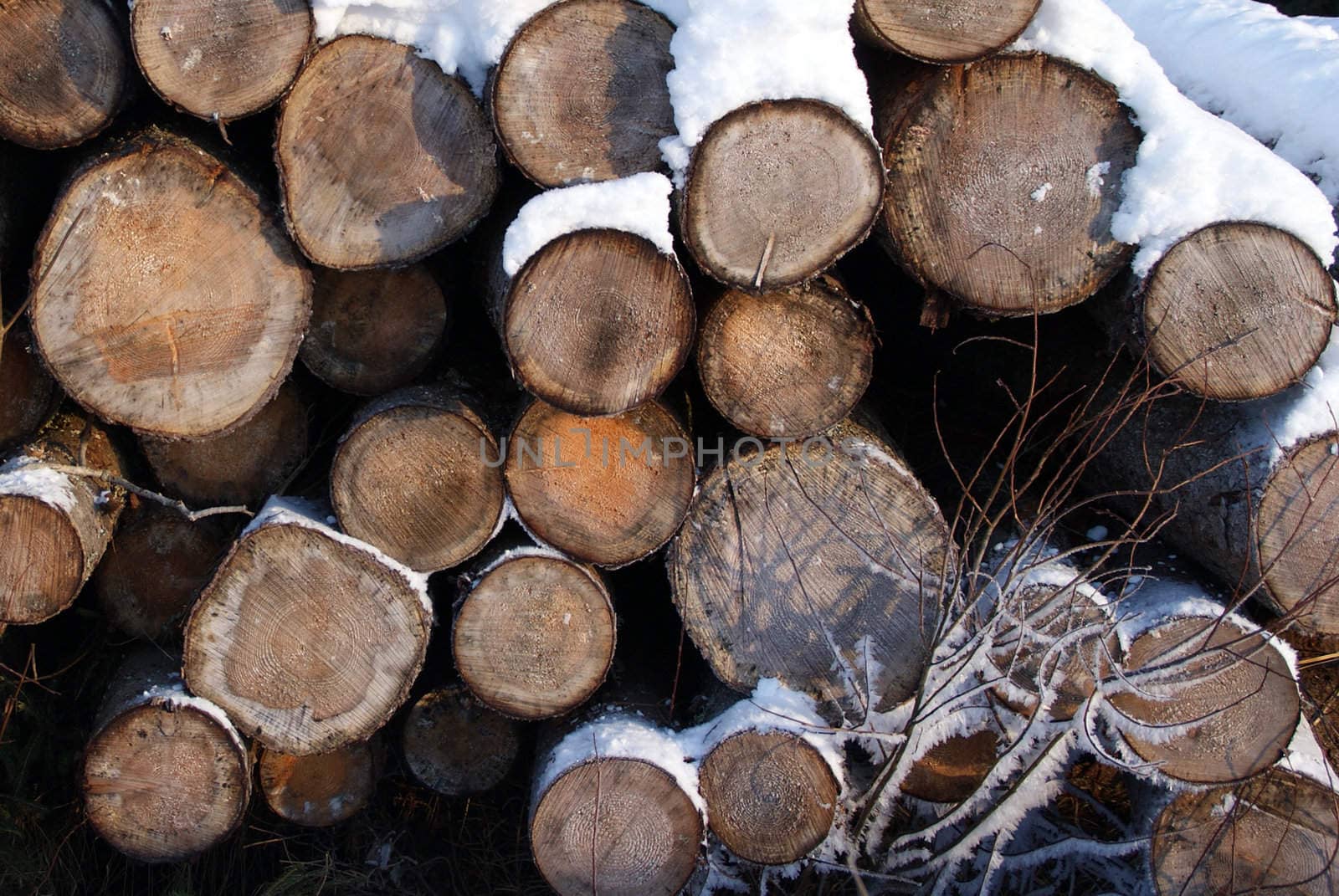 A stack of firewood in winter snow, suitable for background. Photographed in Salo, Finland.