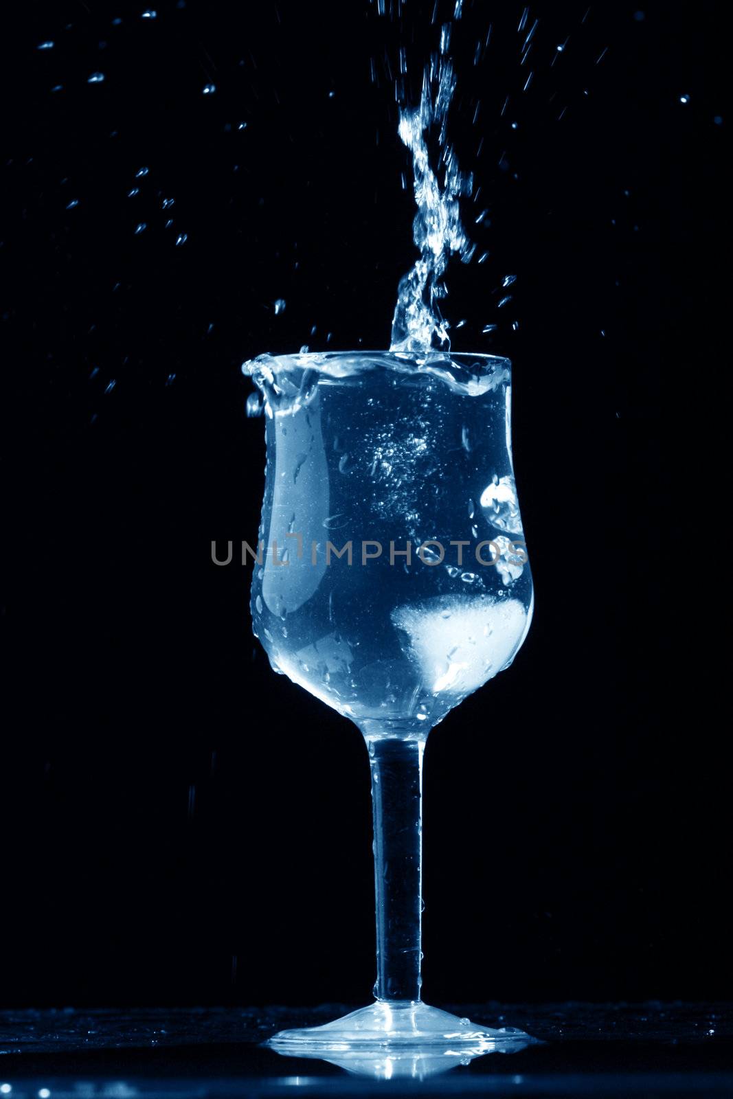 alcohol splash on black  background