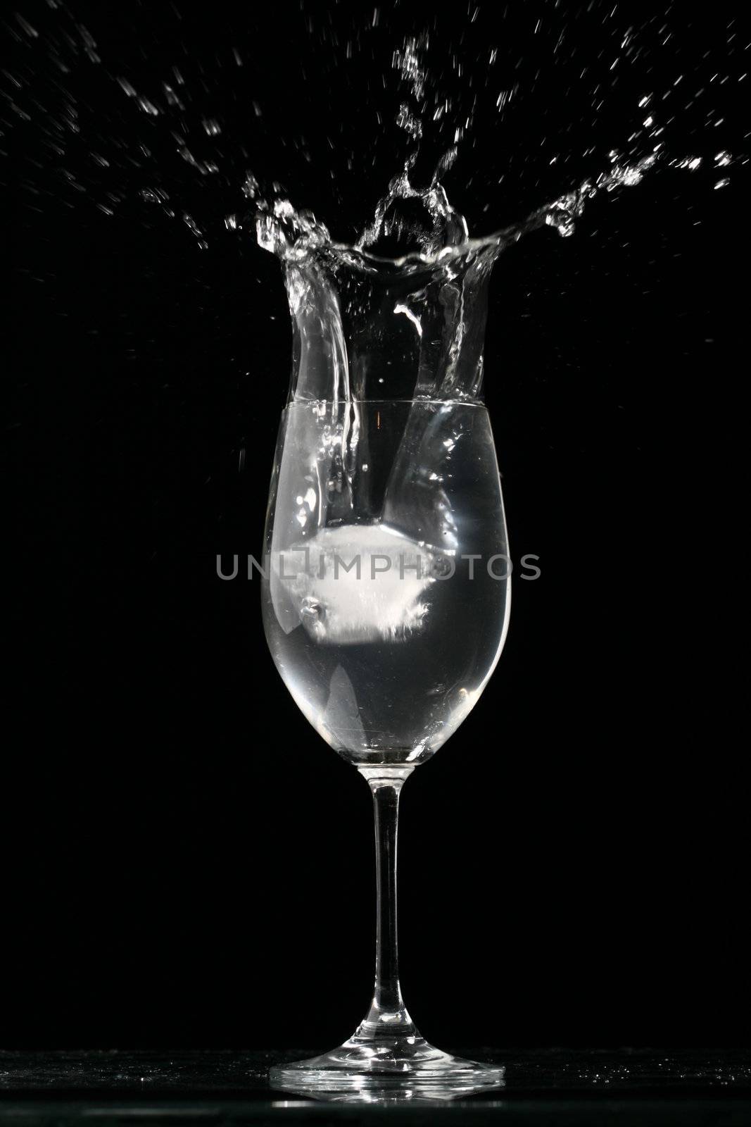 alcohol splash on black  background