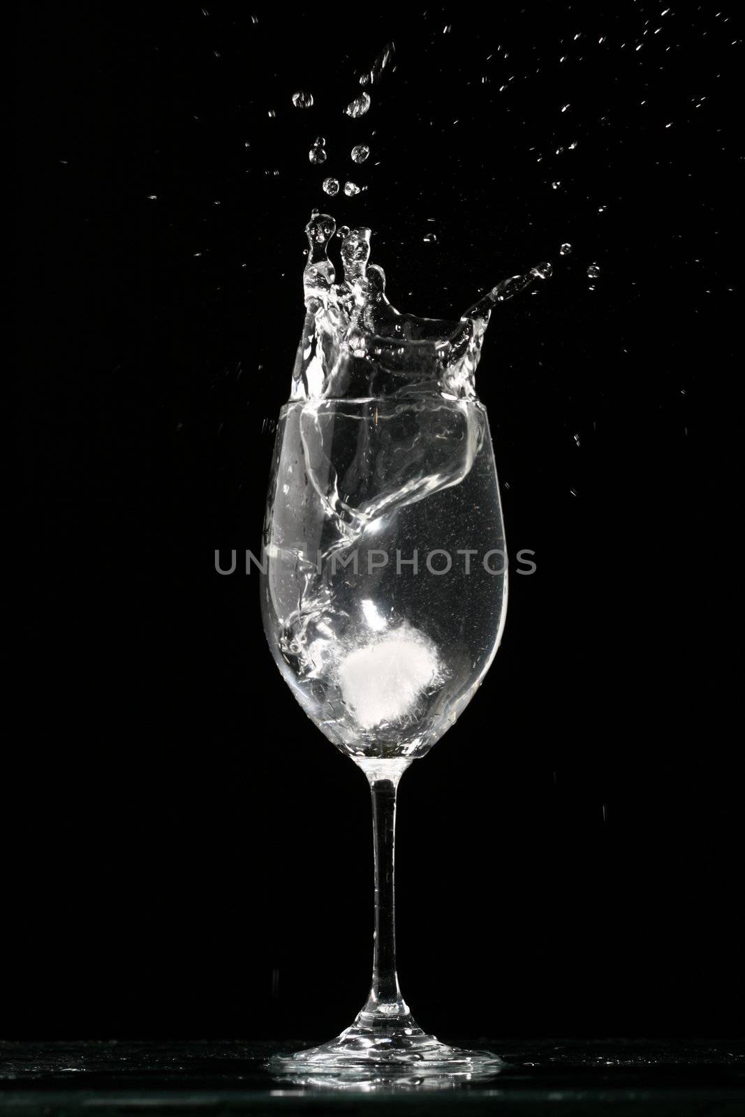 alcohol splash on black  background