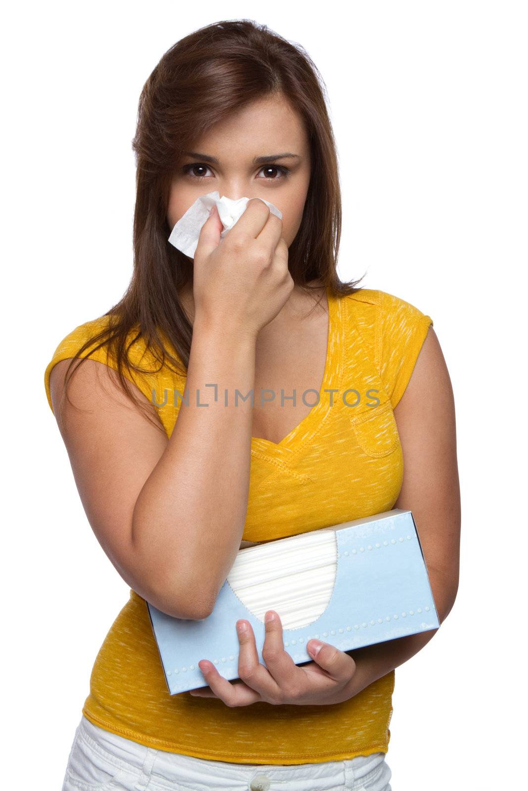 Isolated sick girl blowing nose