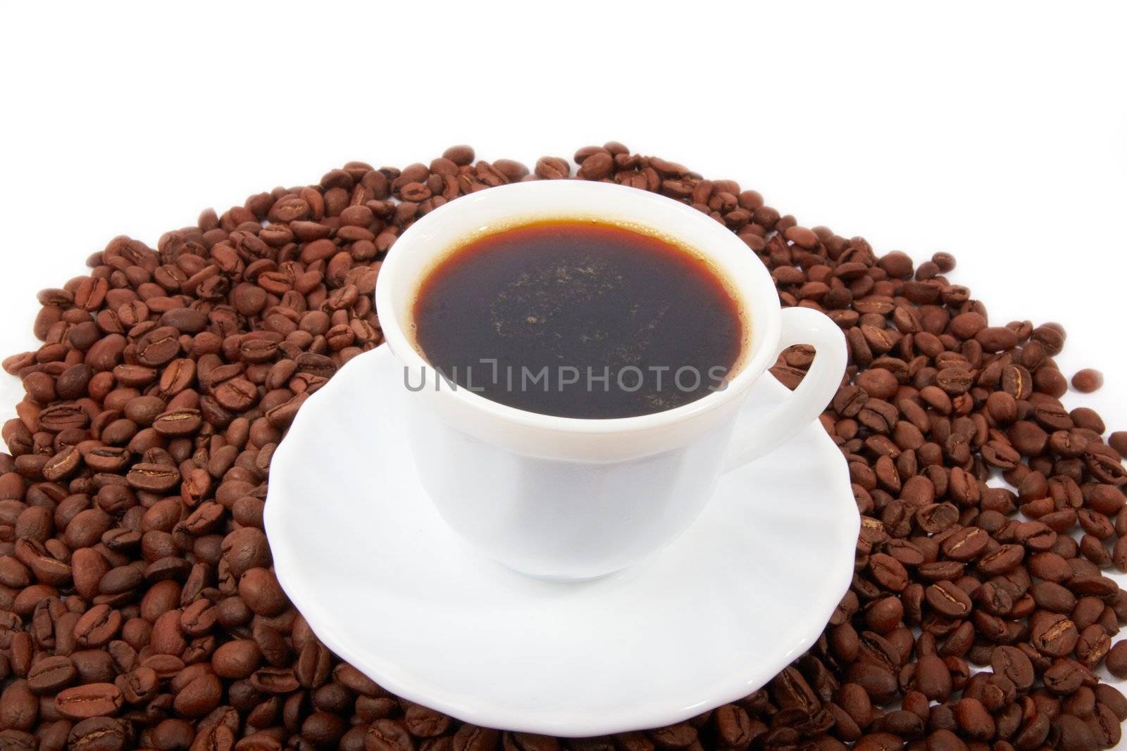 Coffee cup on coffee beans background