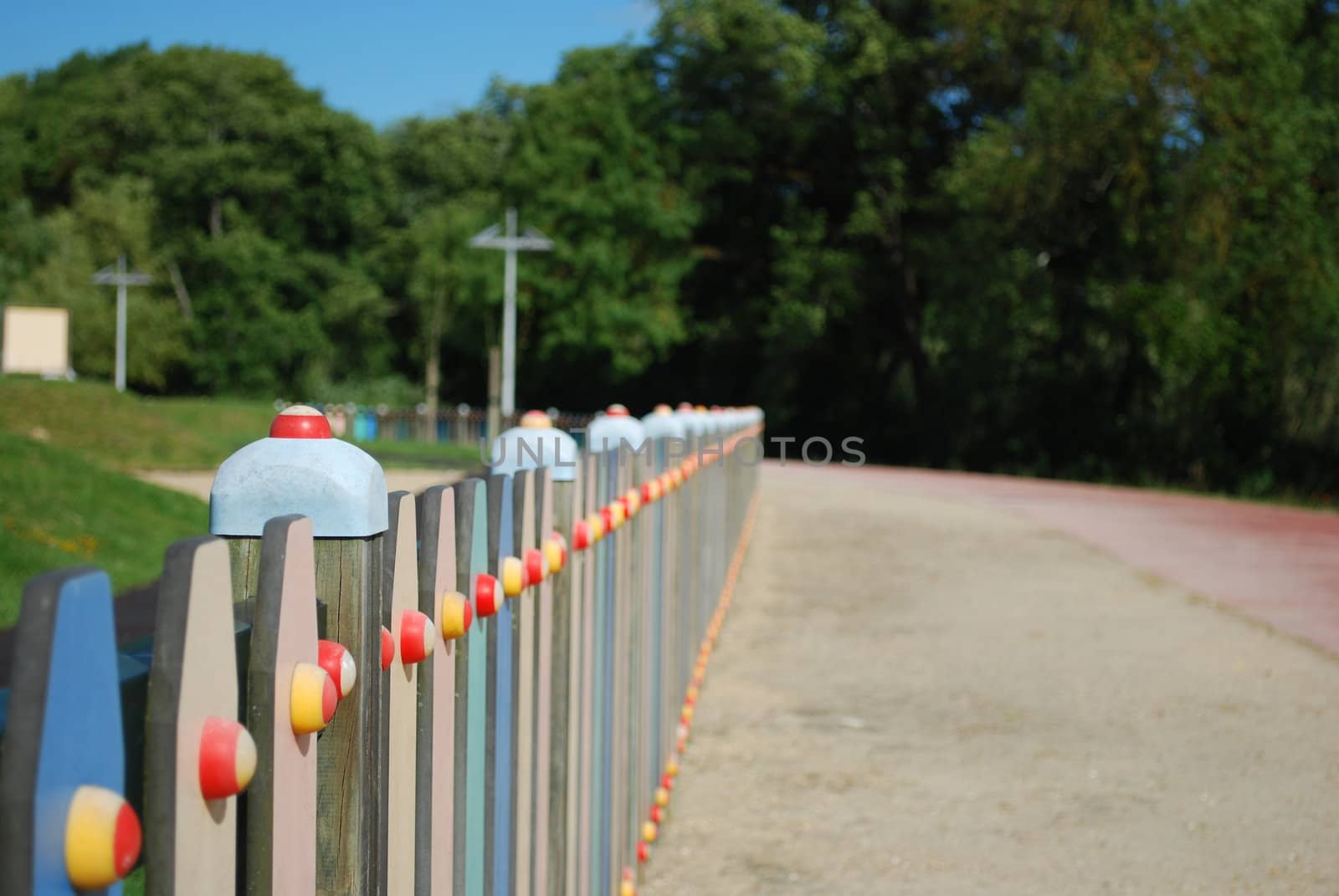 Colored fence on a park by luissantos84