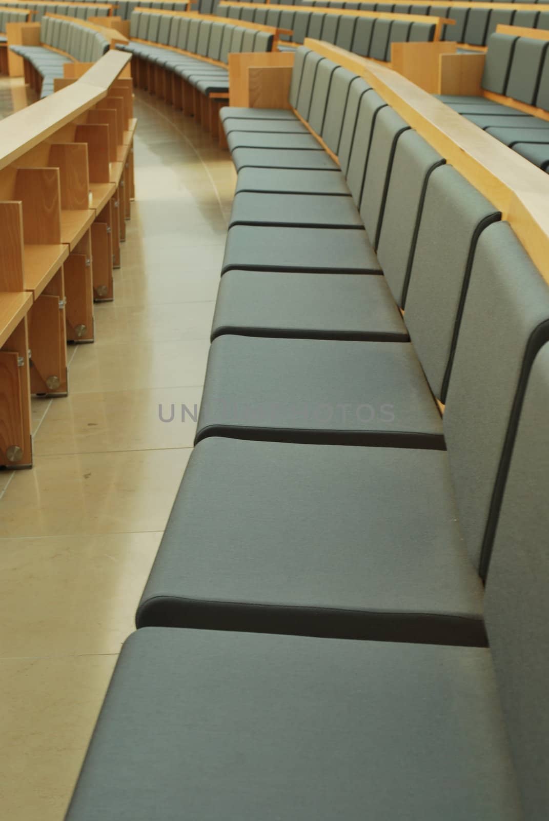 Row of chairs in local theatre by luissantos84