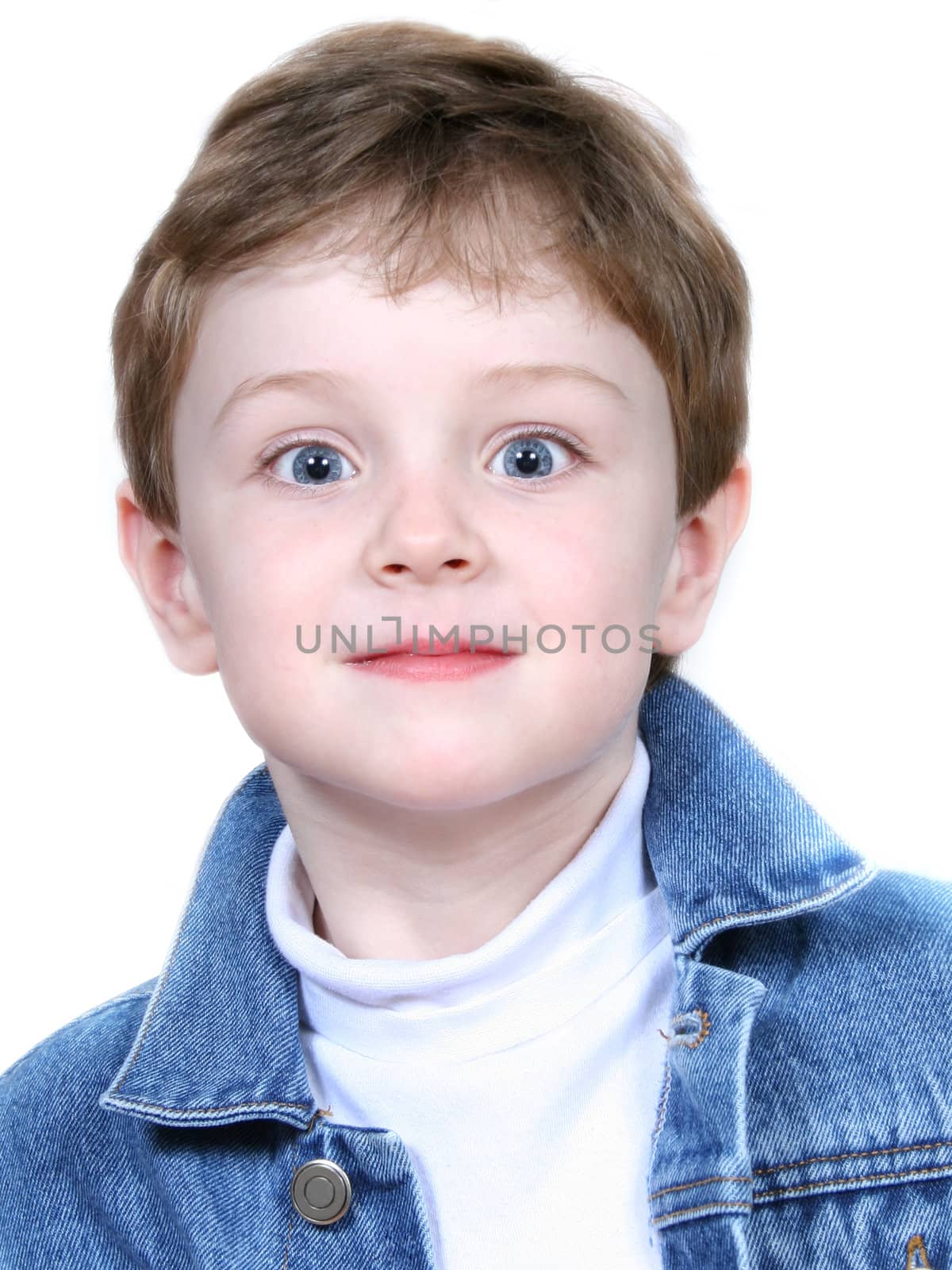 Portrait of boy in denim jacket over white background. Shot with the Canon 20D.