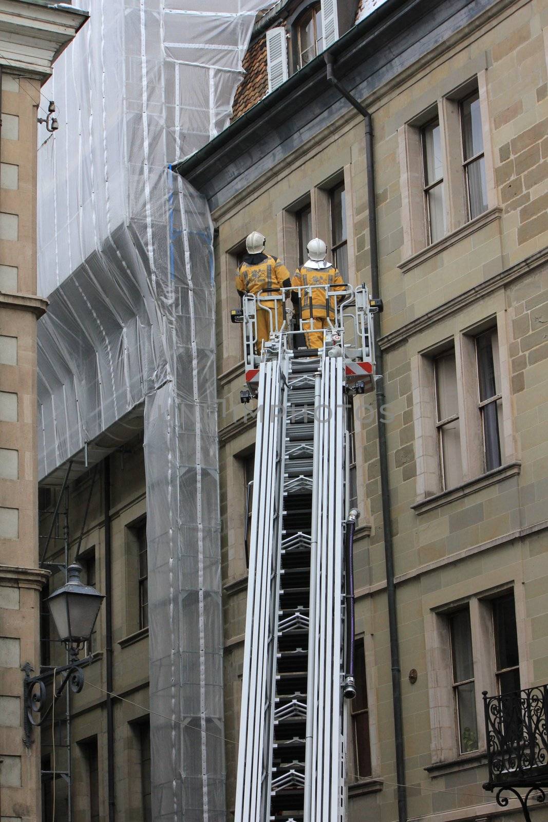 fire man and buildings