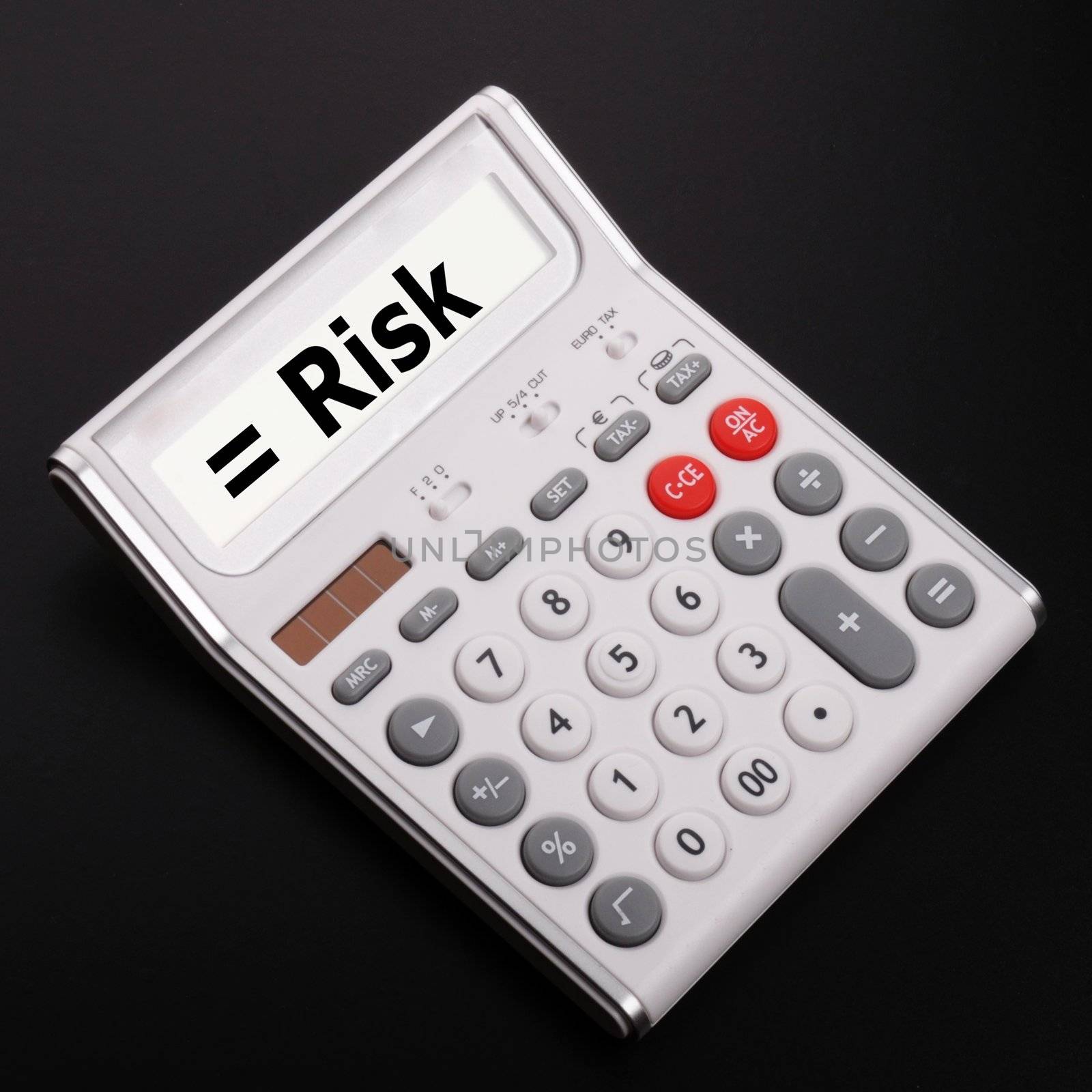 risk management concept with calculator showing financial success