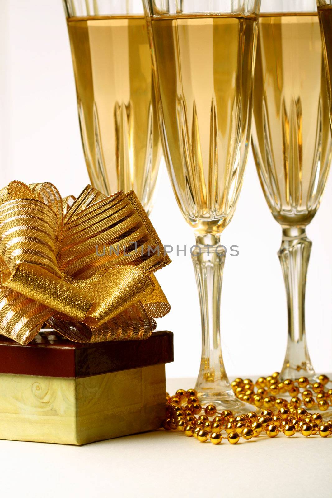 holiday card golden champagne and gift