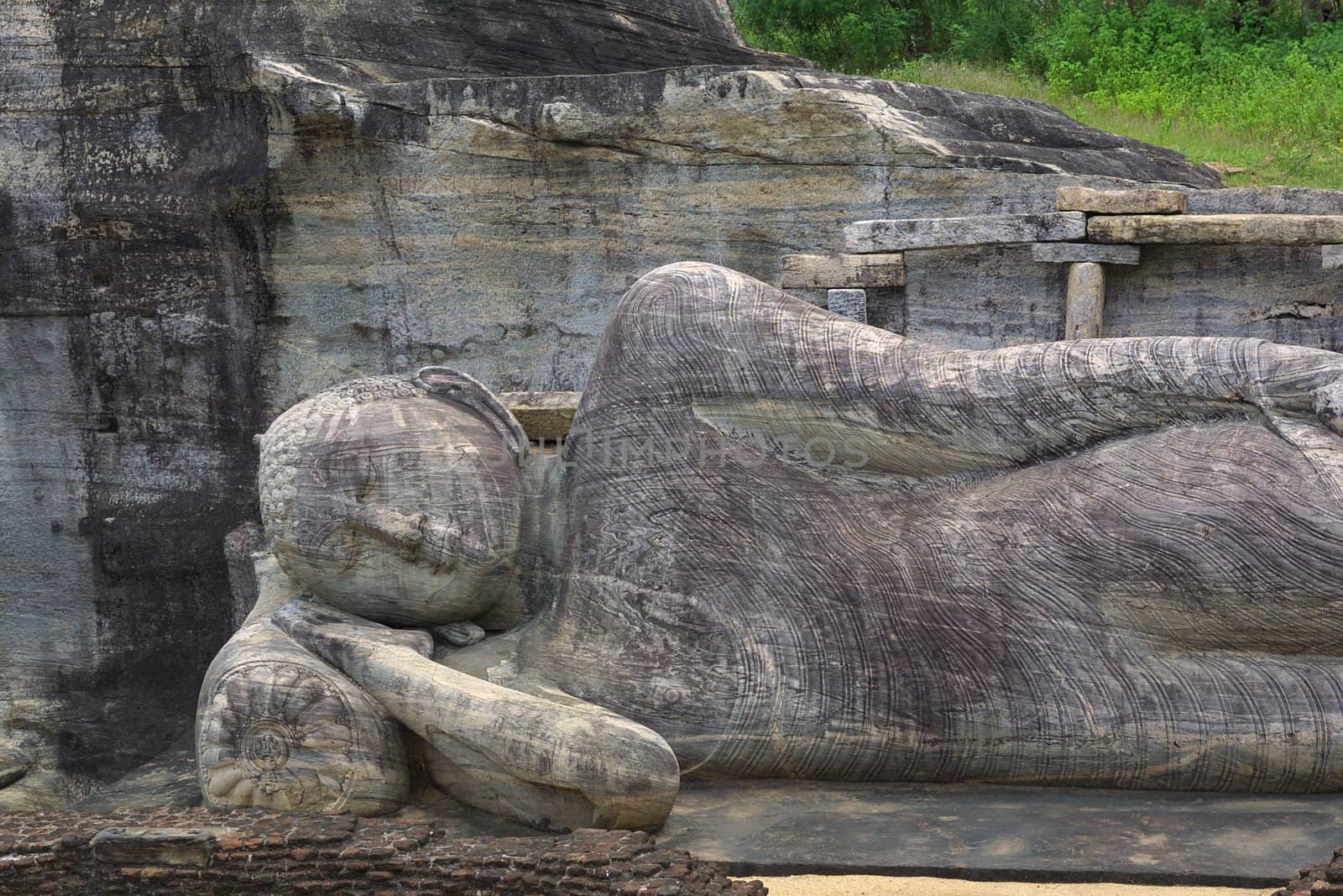 The collosal (14-metre long) Reclining Buddha was carved out of a granite cliff at Gal Vihariya in Pollanaruwa in Sri Lanka. It is part of one of the most important Buddhist shrines in the world and part of a UNESCO World Heritage Site.