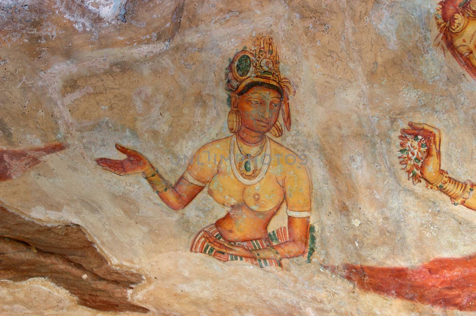 Maiden in the Clouds: one of the 5th century frescoes at the ancient rock fortress of Sigiriya, a UNESCO World Heritage Site in Sri Lanka.