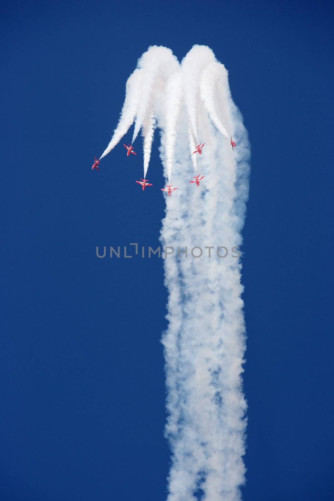 The Royal Air Force's Red Arrows team perform in their BAE Hawk aircraft at the Dubai Airshow in the United Arab Emirates.