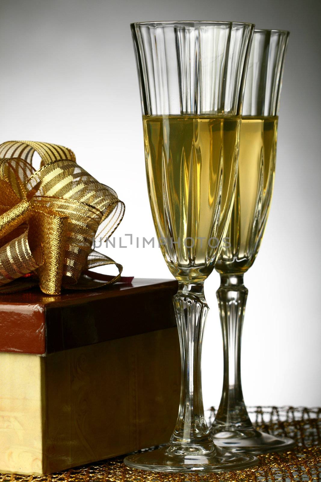 holiday card golden champagne and gift