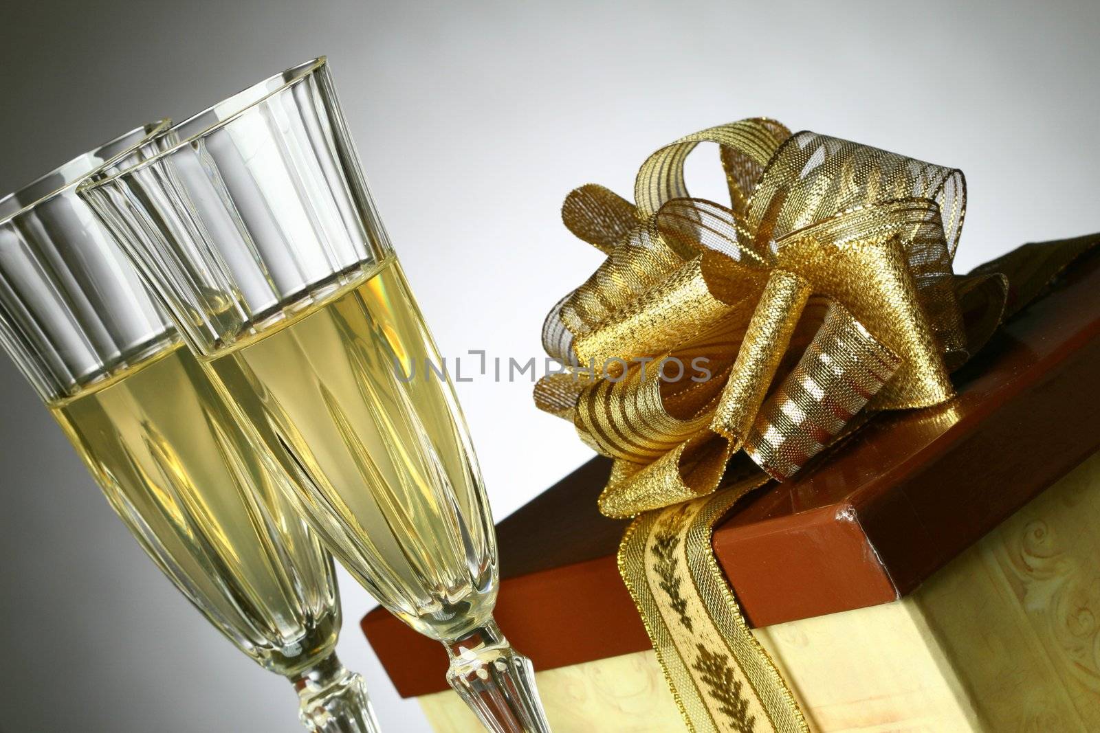 holiday card golden champagne and gift