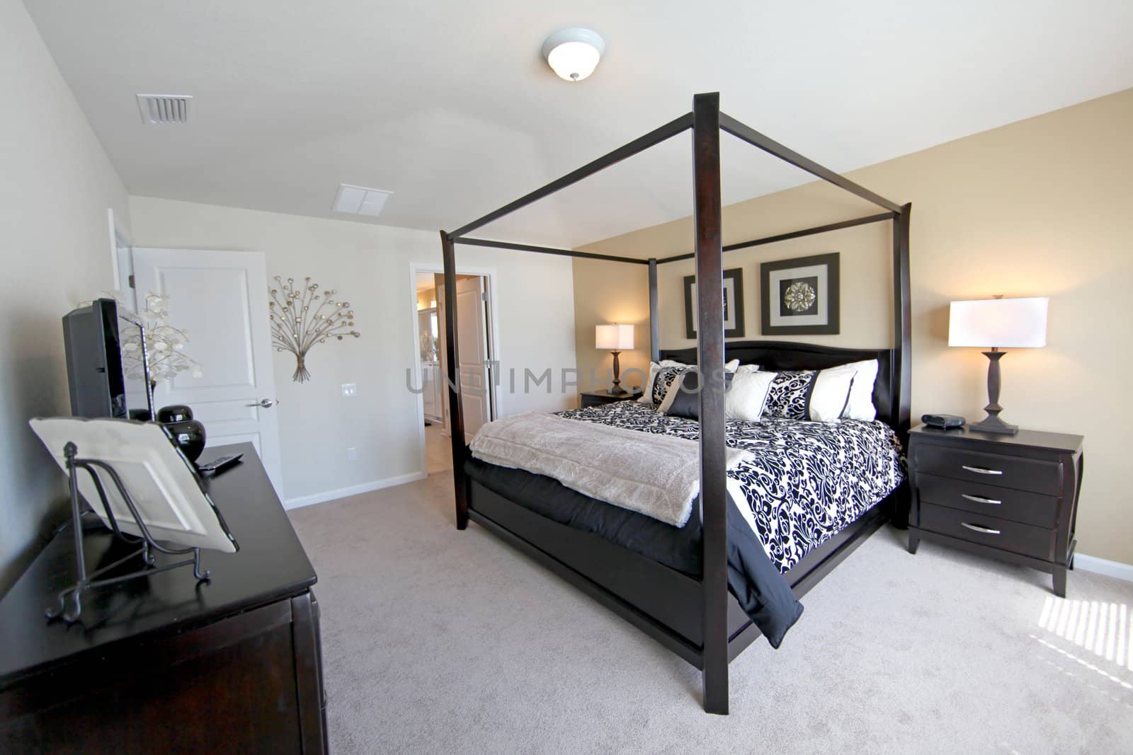 A King Master Bedroom, interior shot of a Home