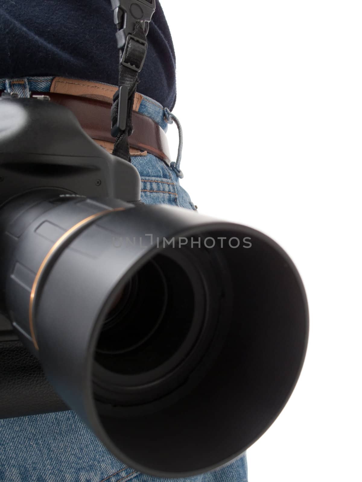 A modern SLR camera hanging off of the back, shot pointing towards the lens, isolated on white.