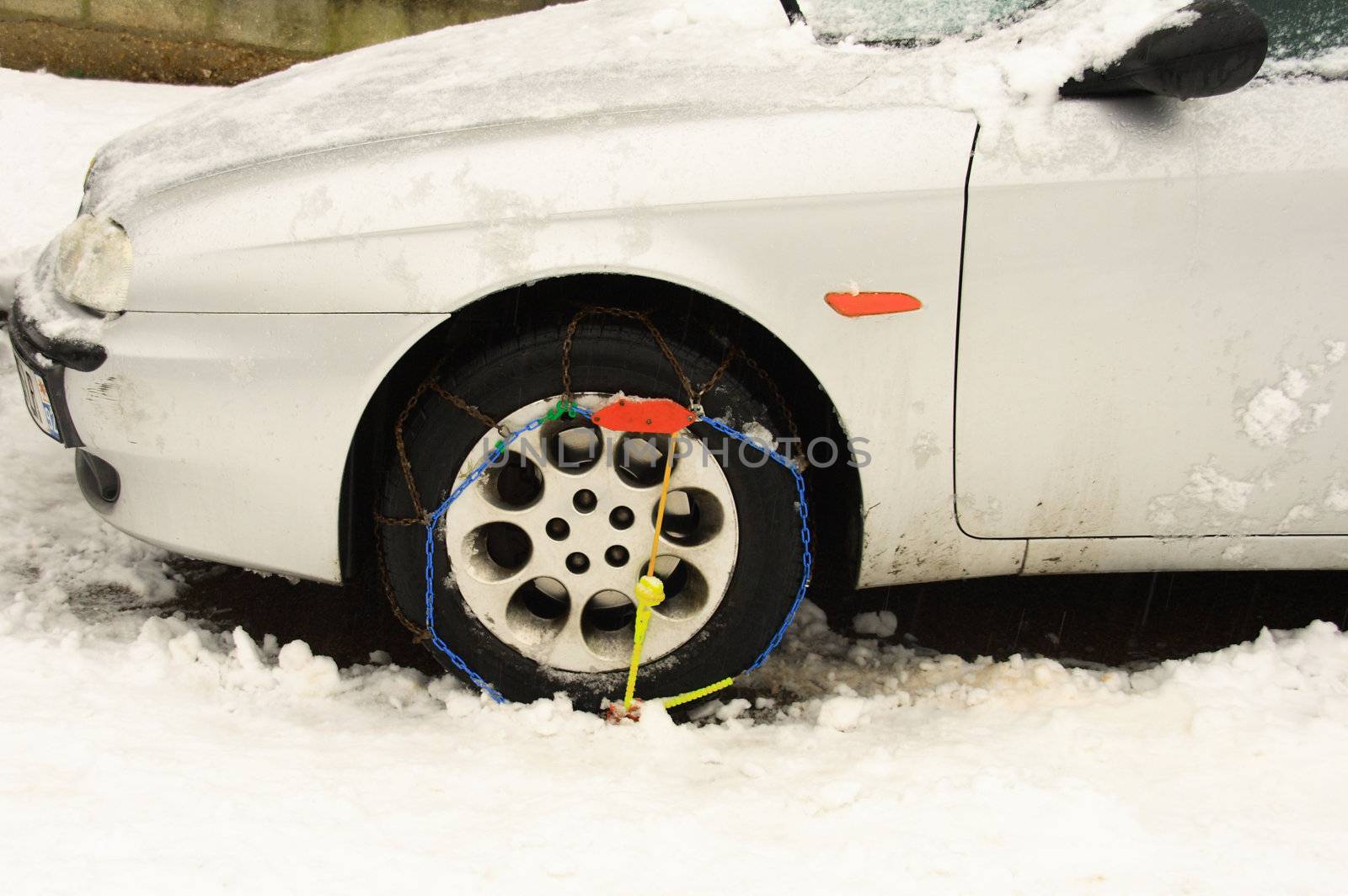 Car with tire snows to face winter