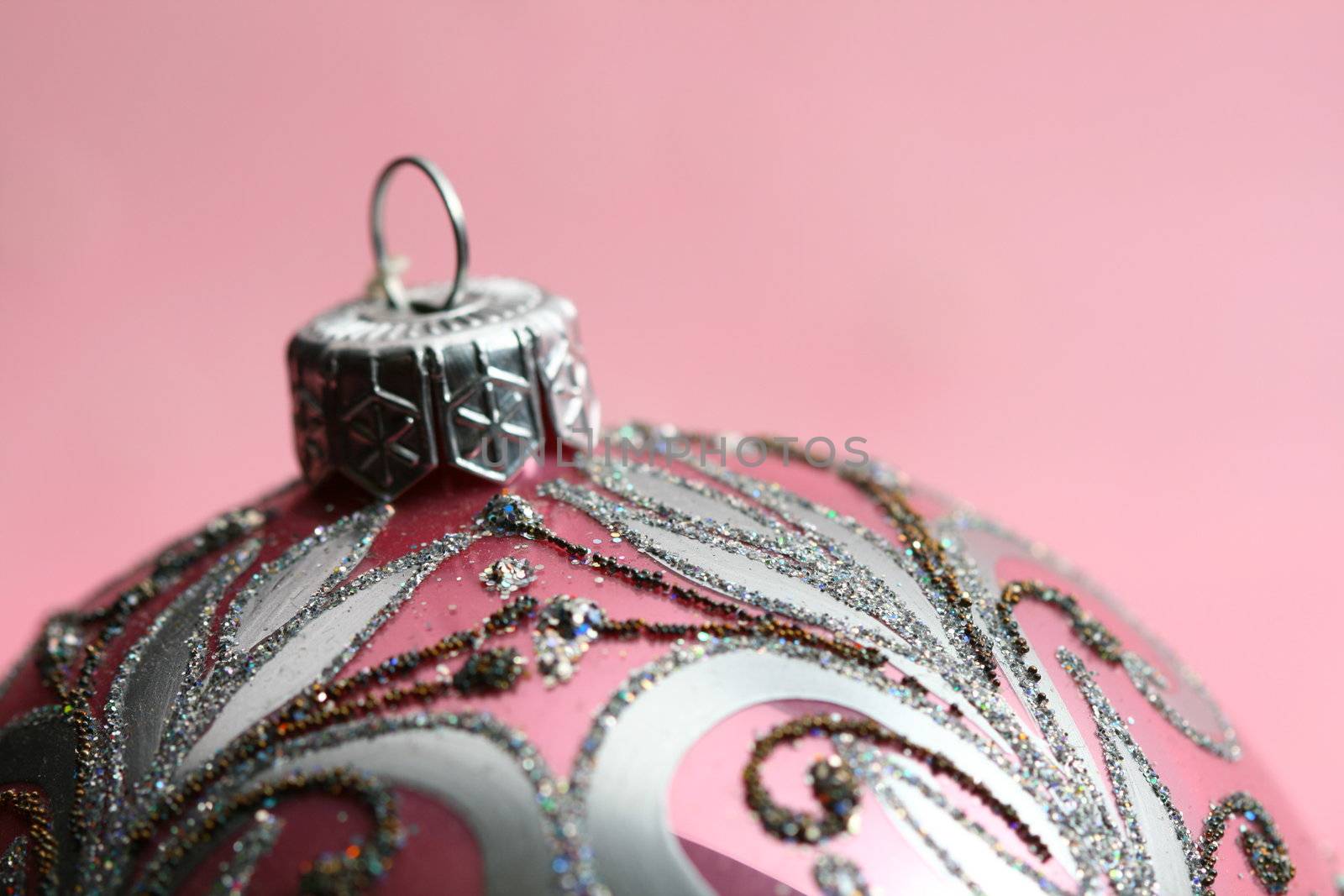 christmas card ball on pink background