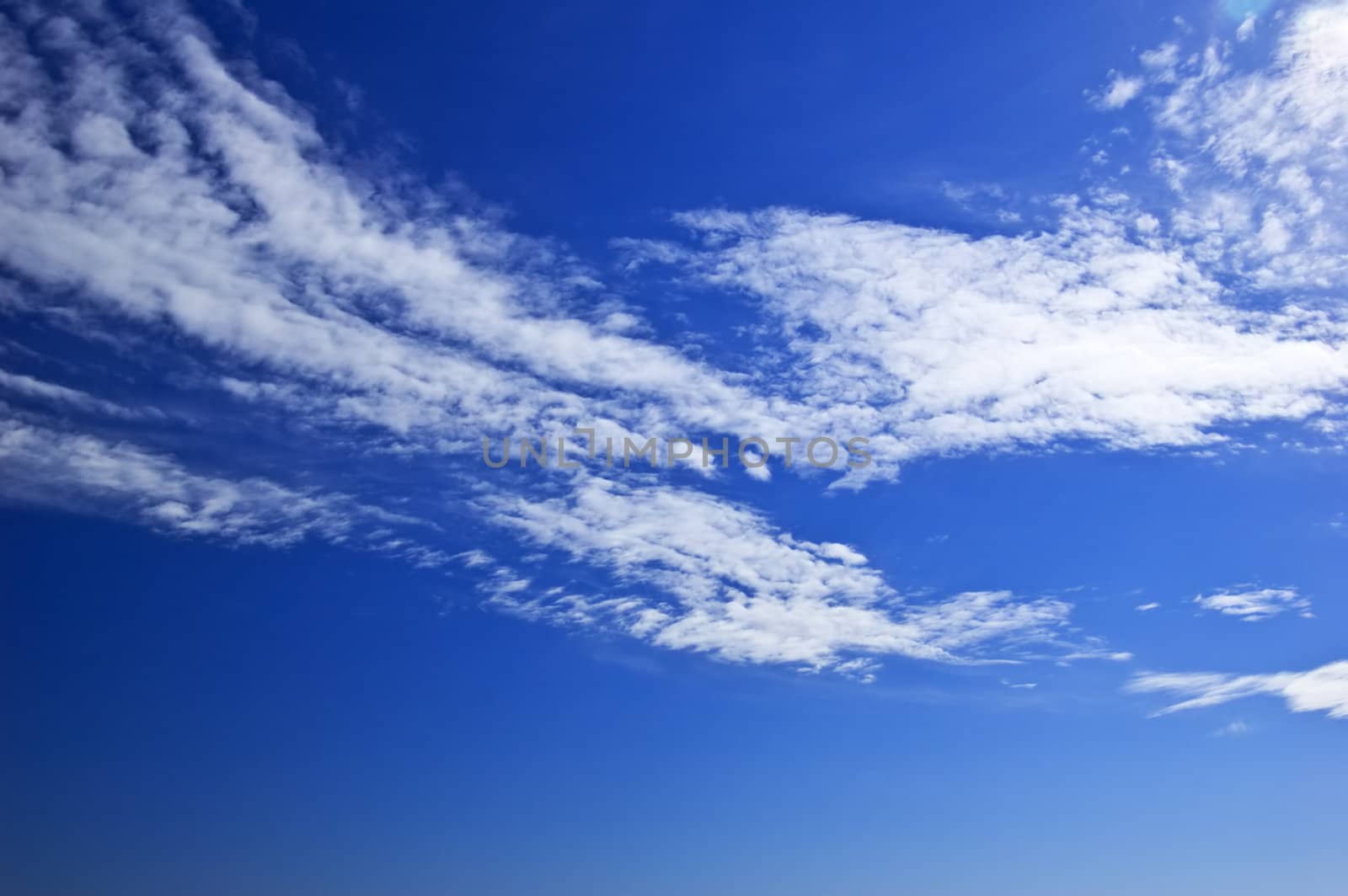 White clouds on blue sky by mylips