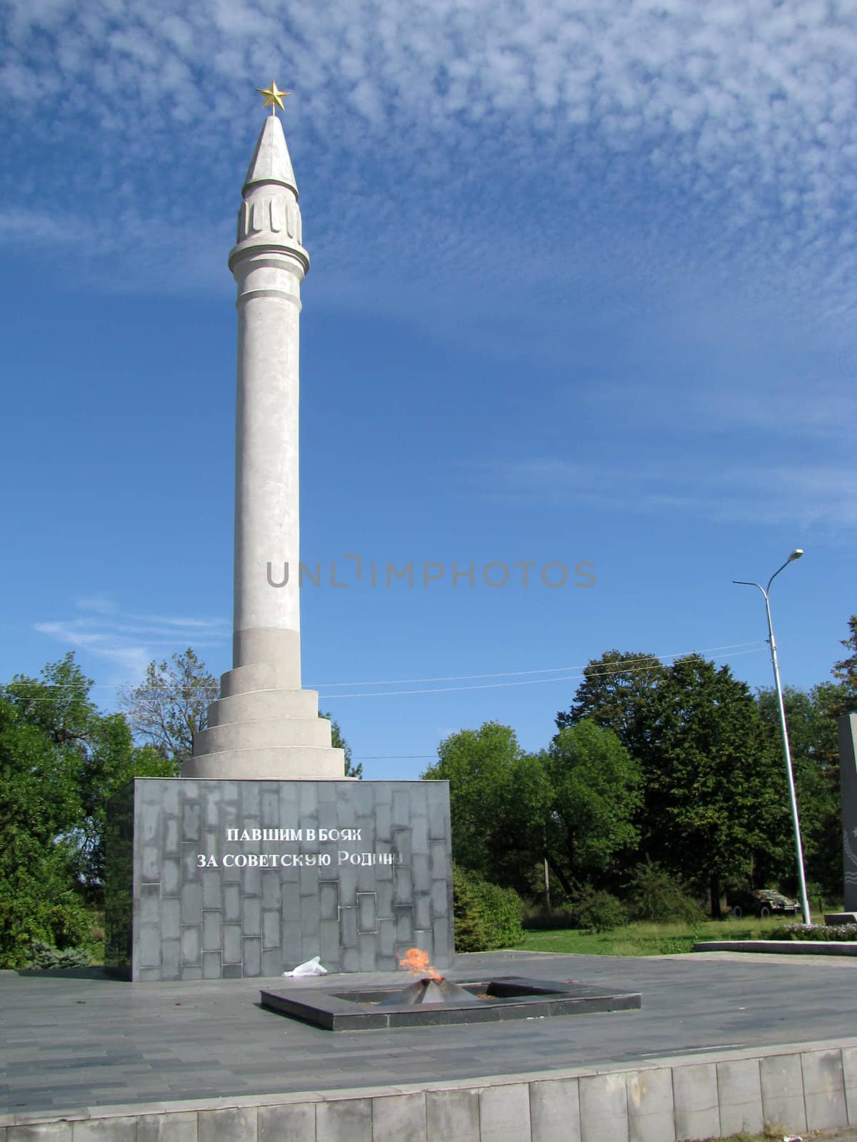 Monument; eternal flame; laid; architectral building; styles; park