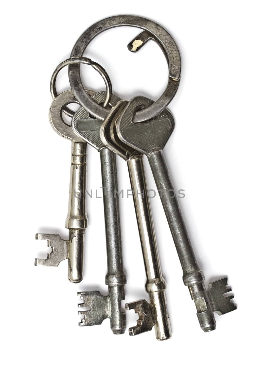 A bunch of old keys isolated on white background