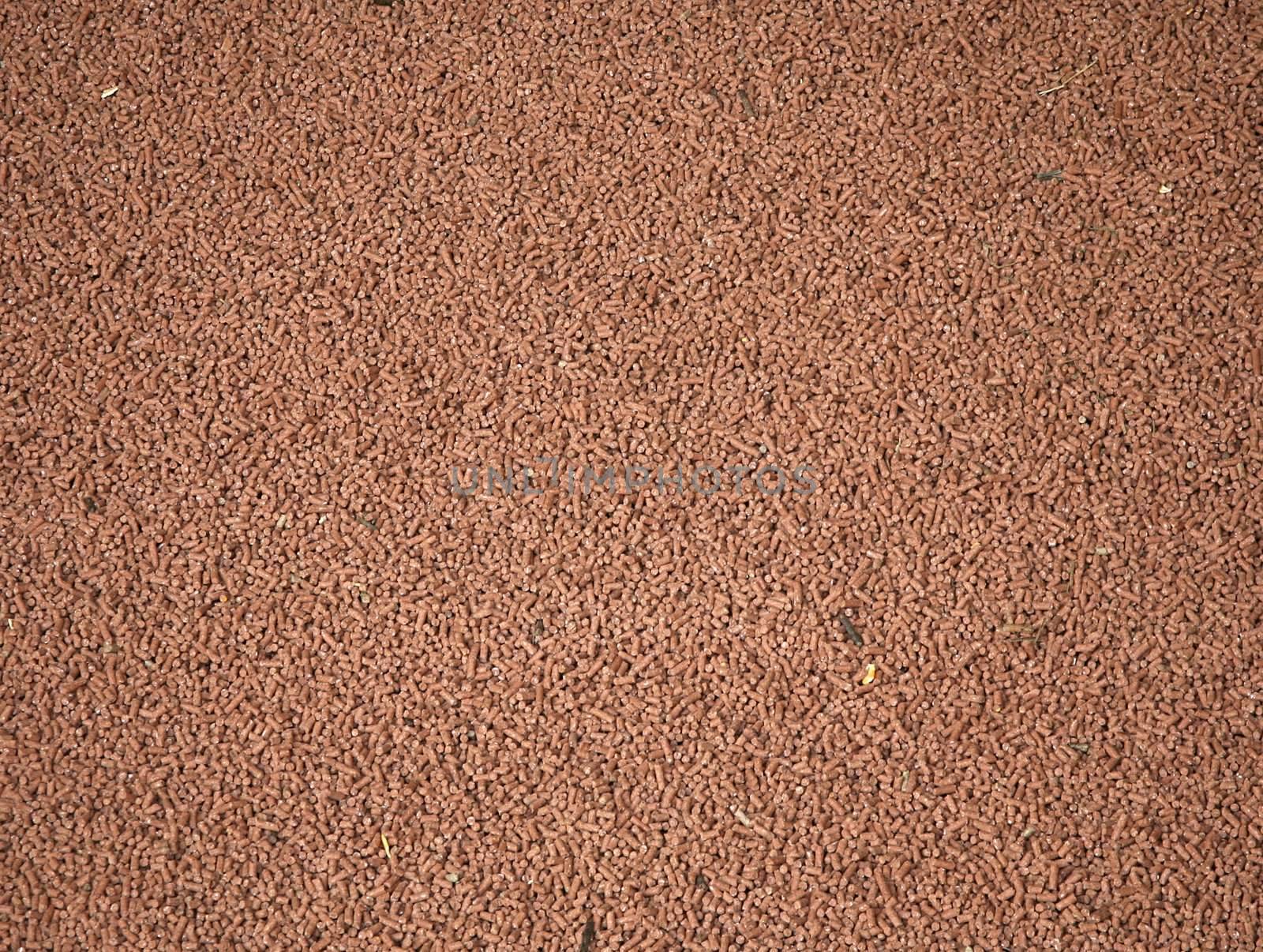Background of food pellets used at a dairy to feed the cows