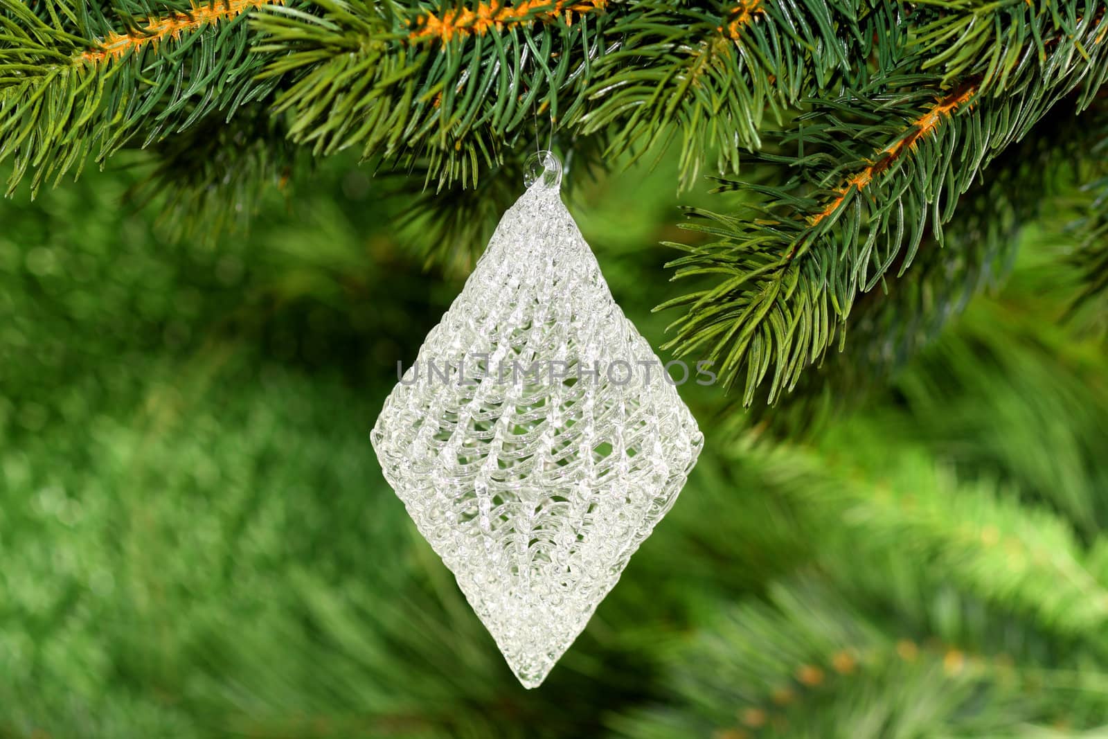 Christmas tree decoration on green background