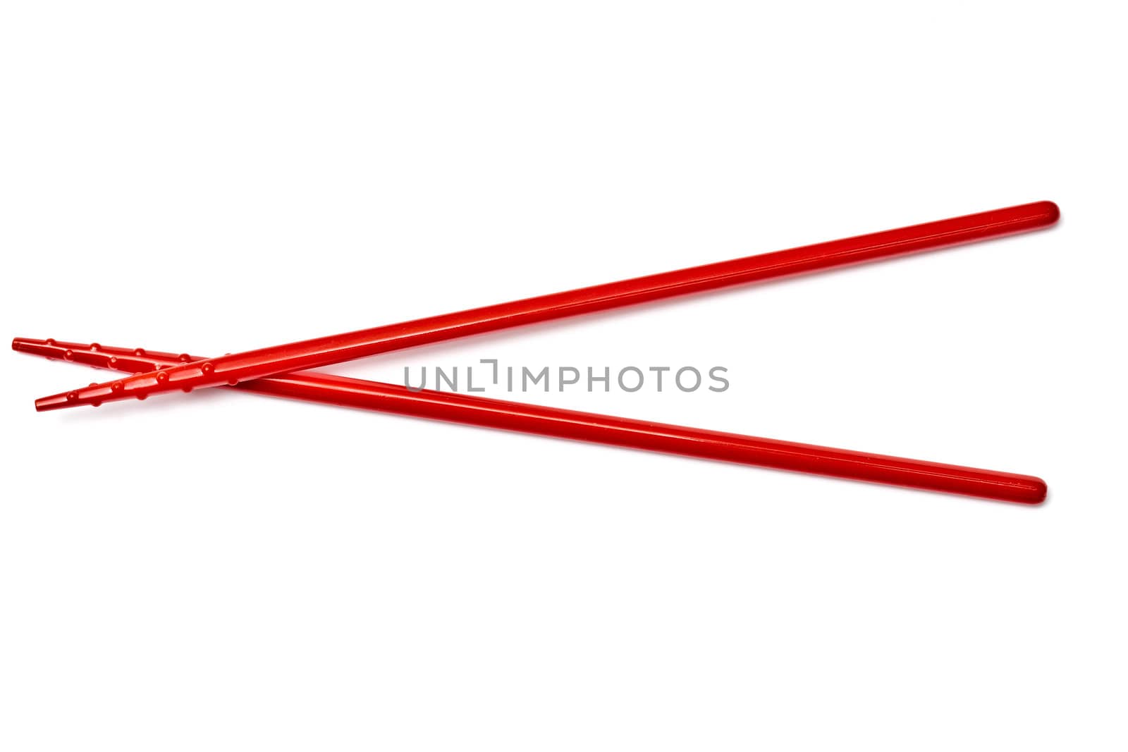 Red chopsticks isolated on white background