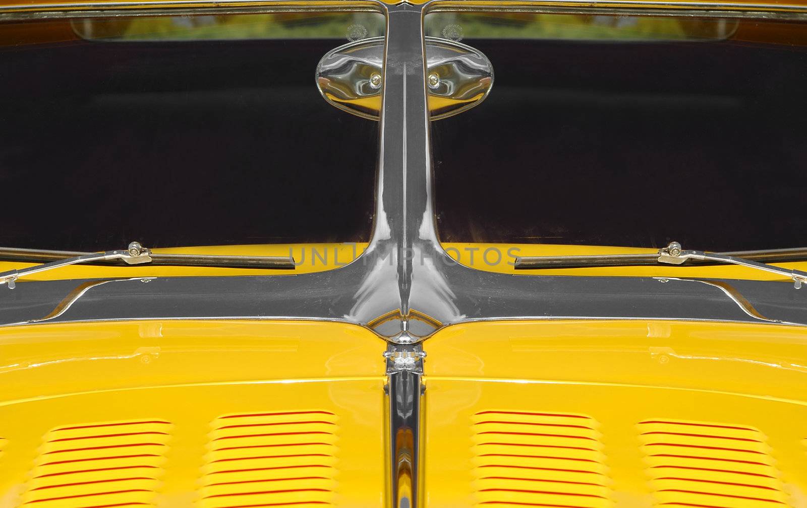 american muscle car hood and windshield close-up