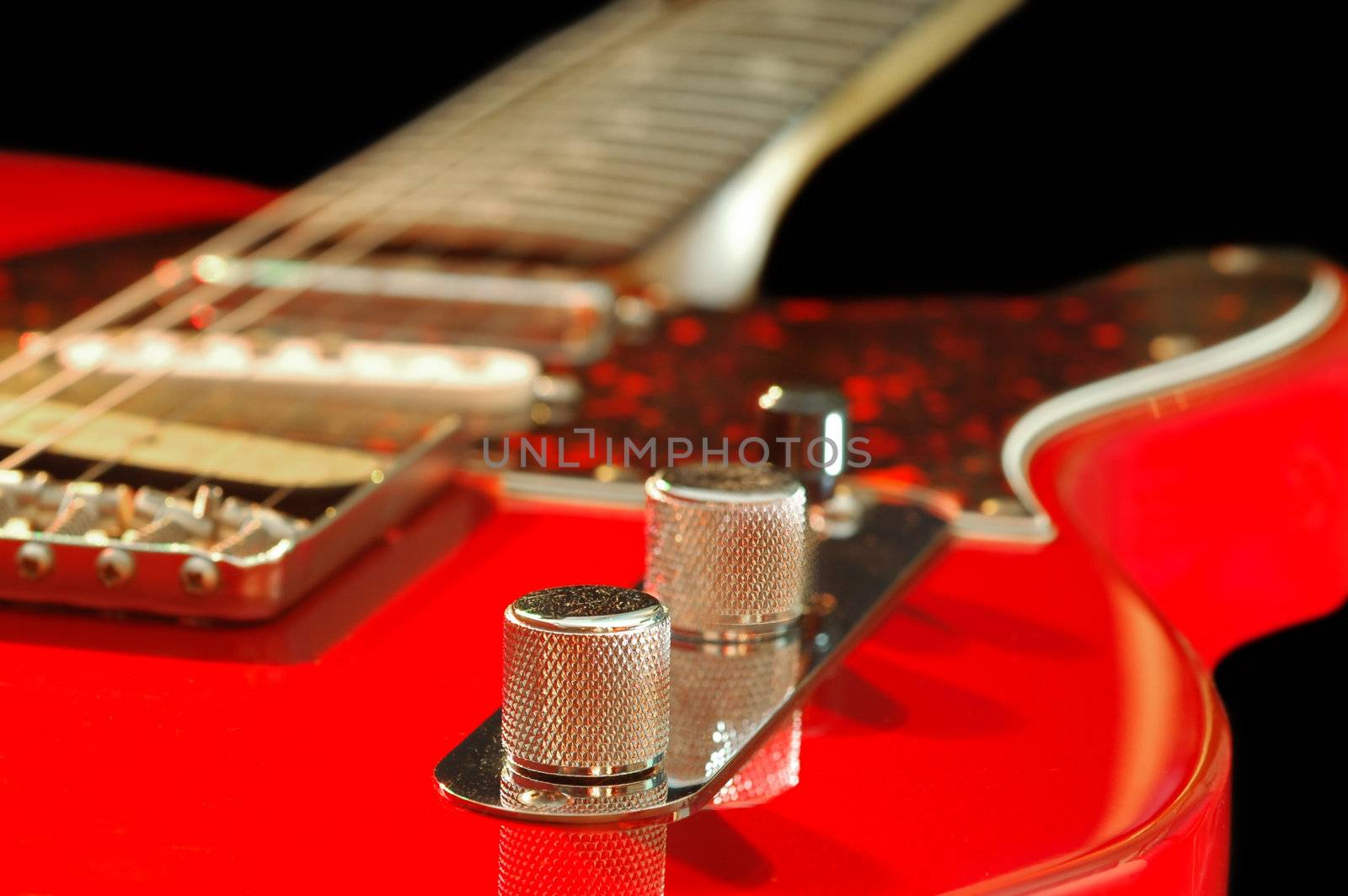 vintage red electric guitar close-up