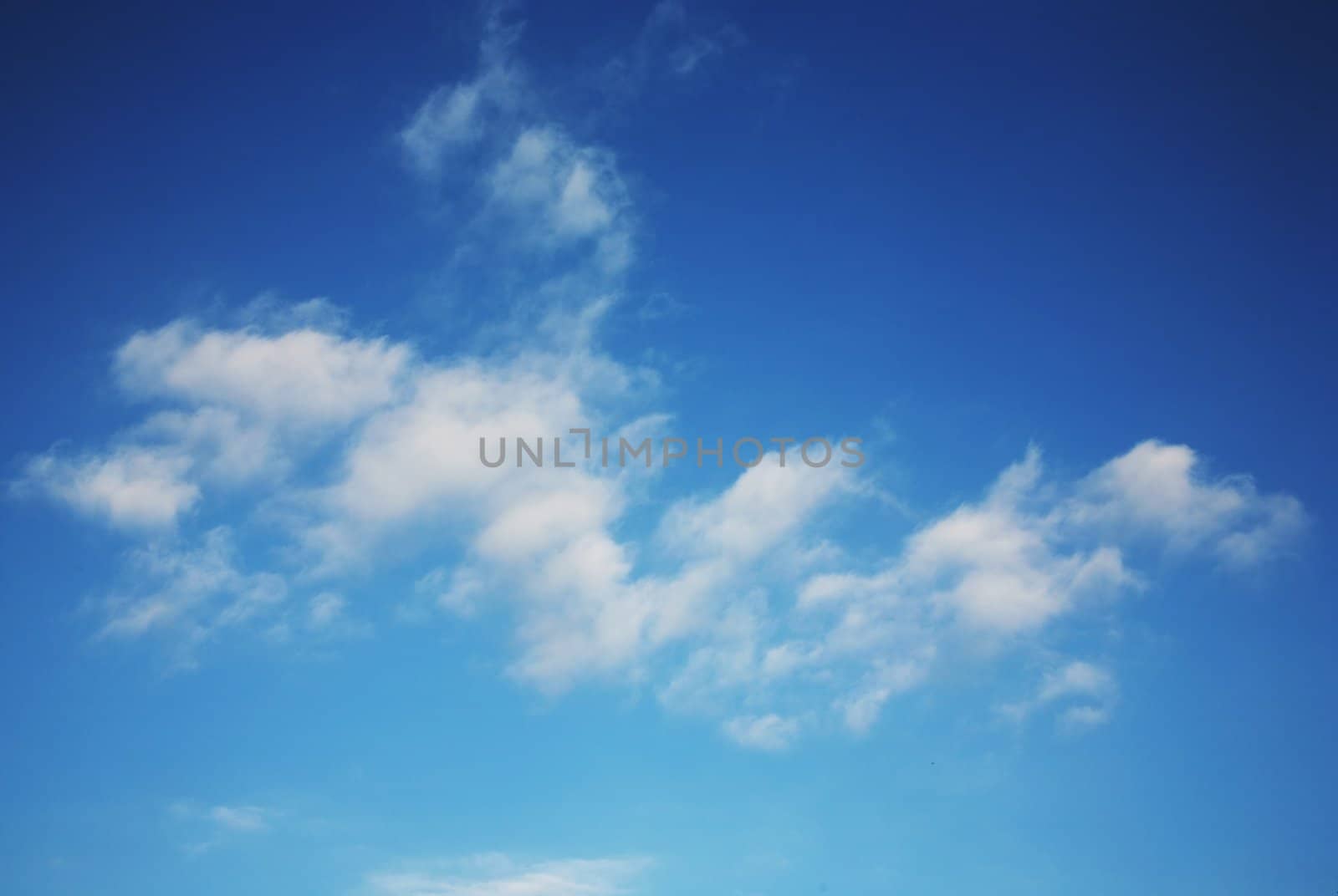 Beautiful deep blue sky with gorgeous white clouds