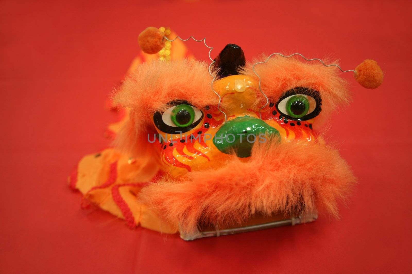 Chinese new year decoration on bright orange tablecloth