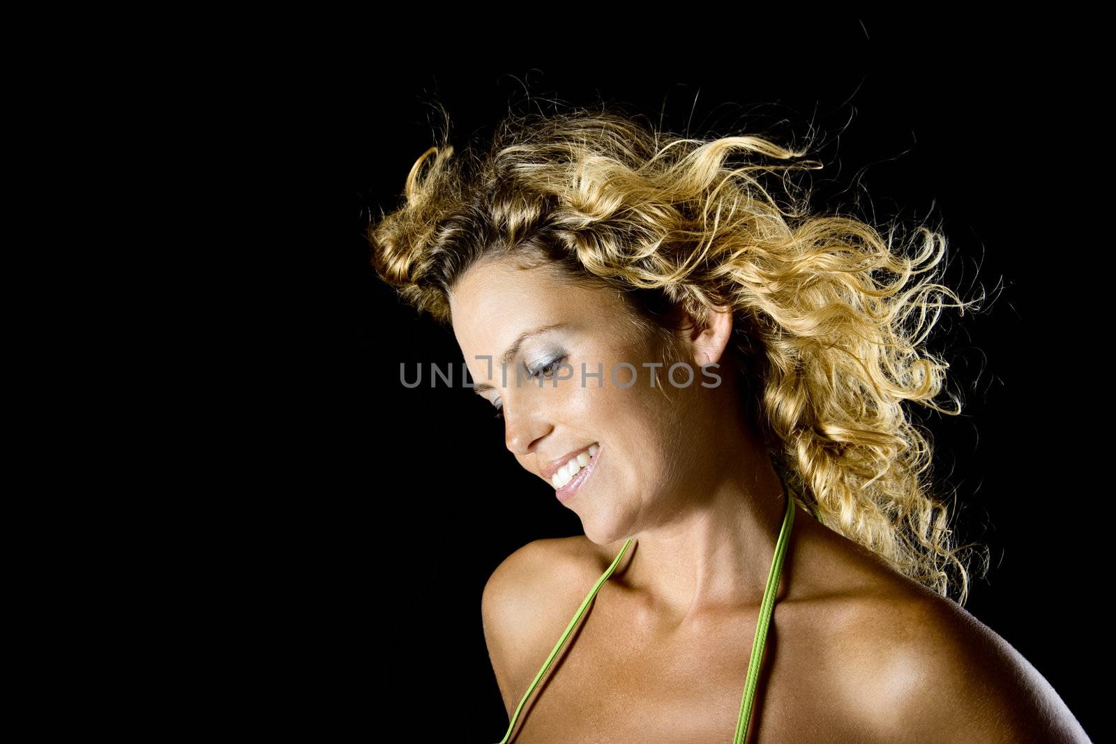 Beautiful woman portrait isolated on black background