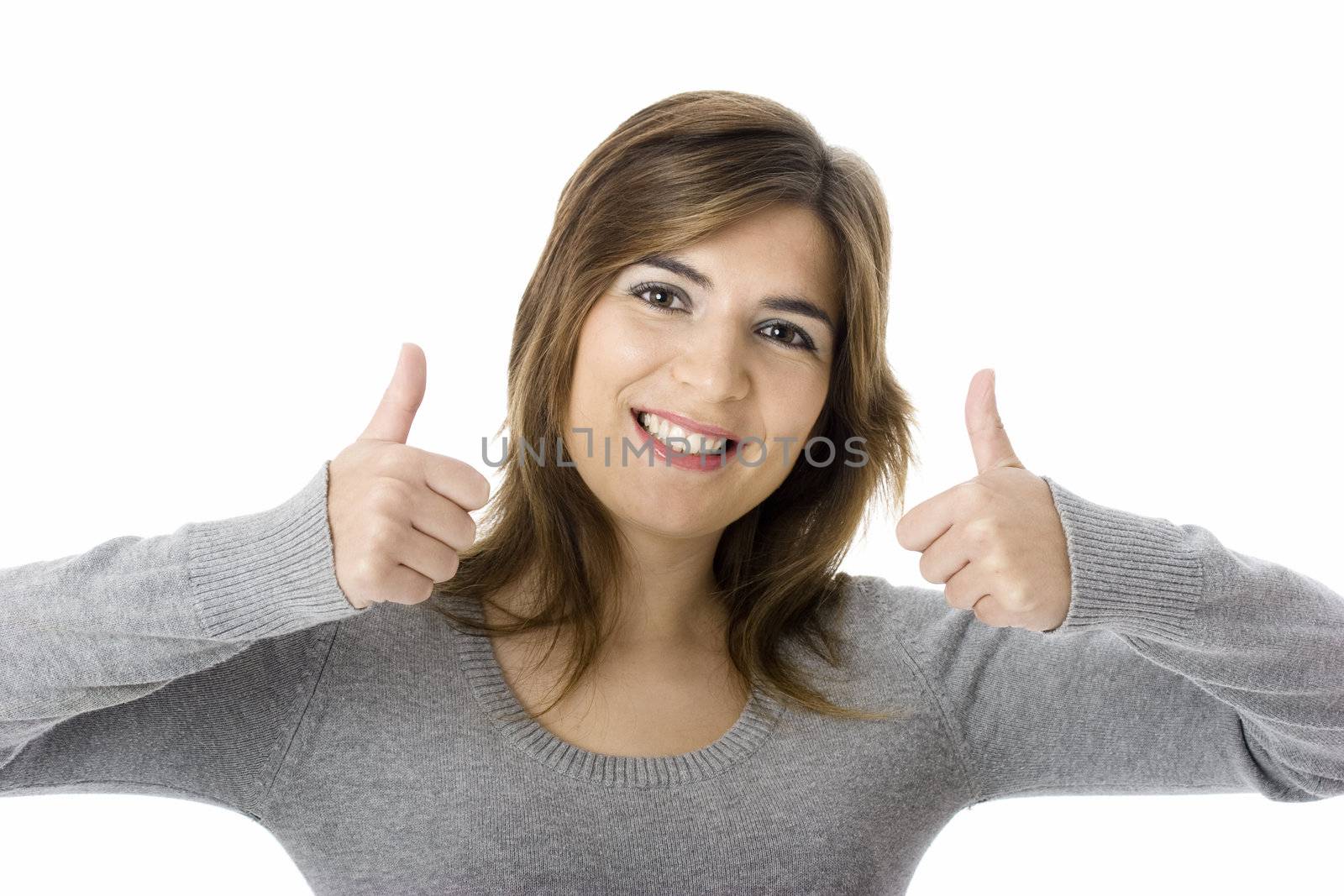Portrait of an attractive young woman with thumbs up. - Isolated on white

