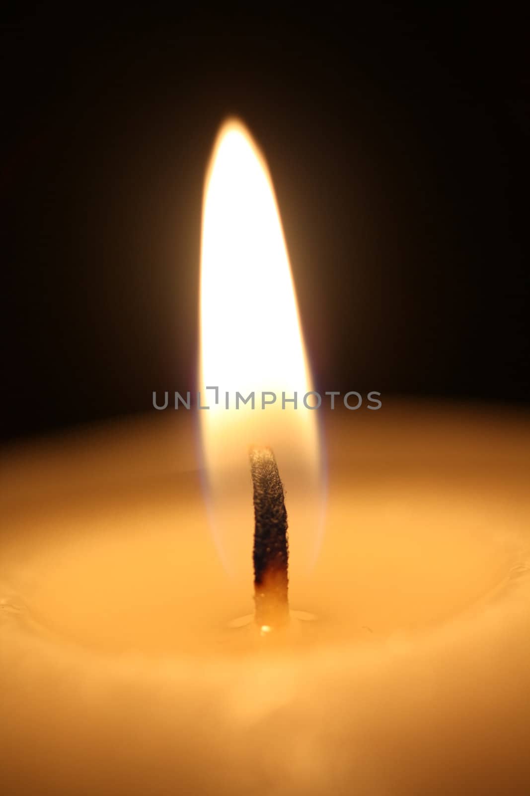 Close up of a burning candle flame 