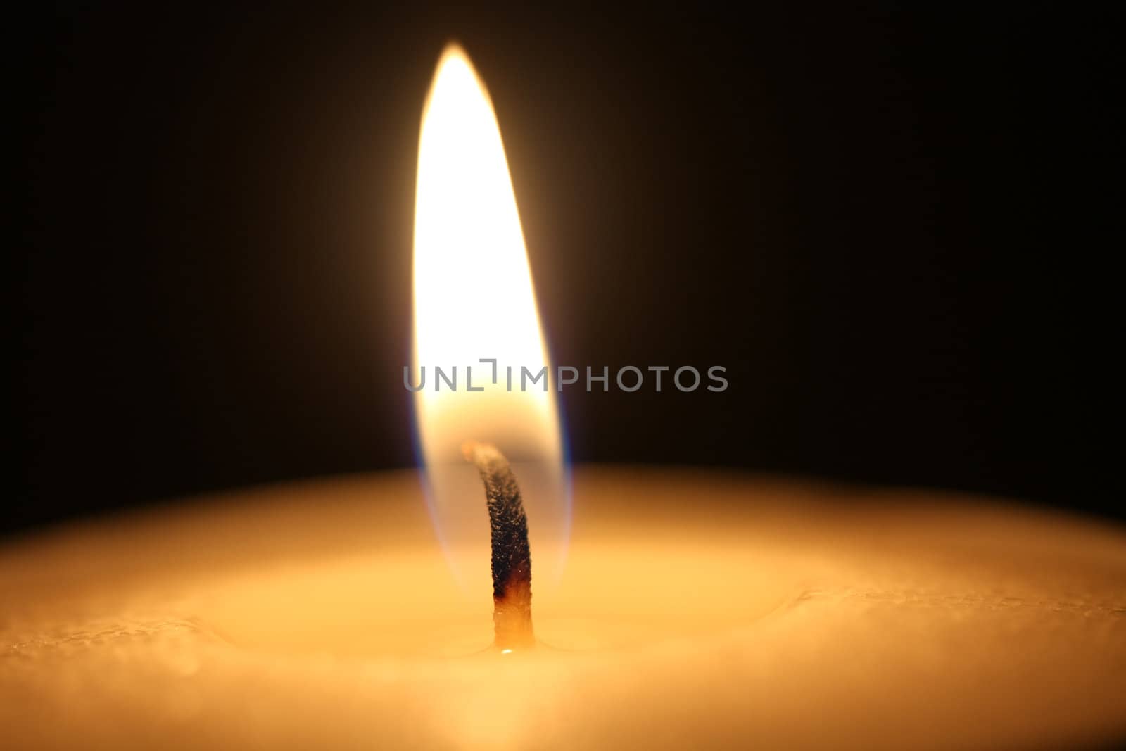 Close up of a burning candle flame