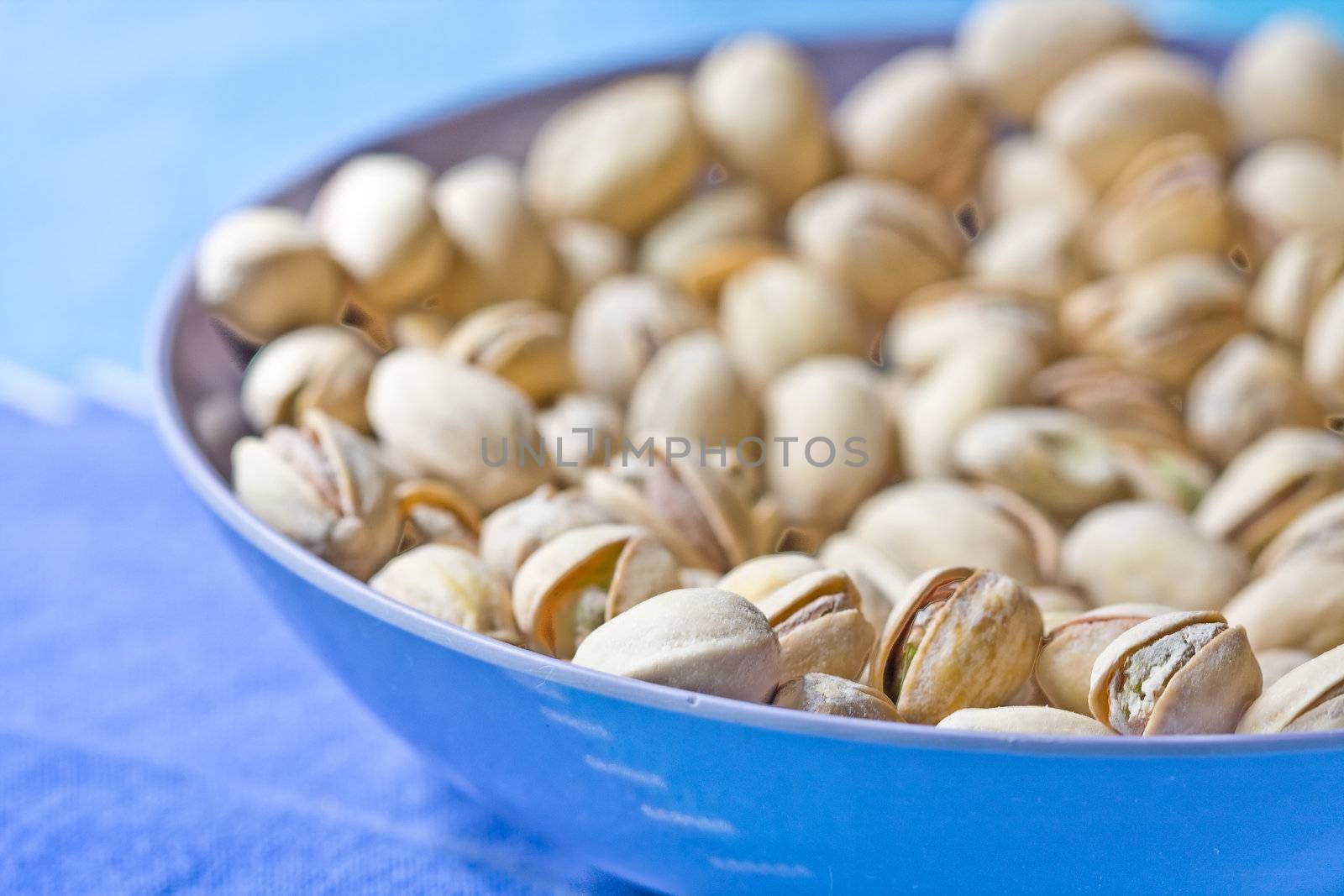 healthy nuts pistachios in a bowl shallow depth of view