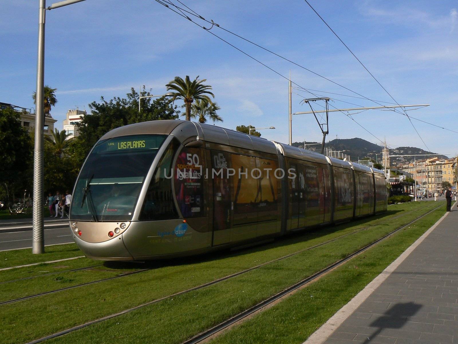 tramway and grass green and sky blue