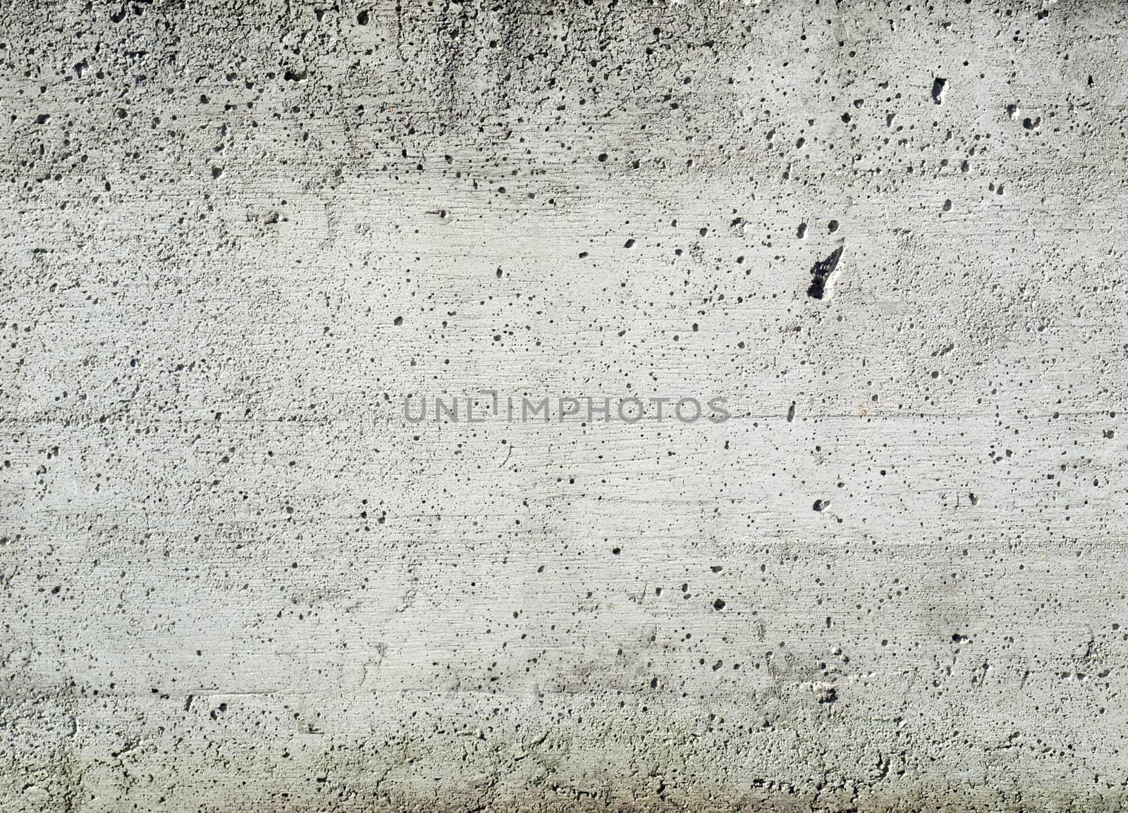 Reinforced concrete wall useful as a background