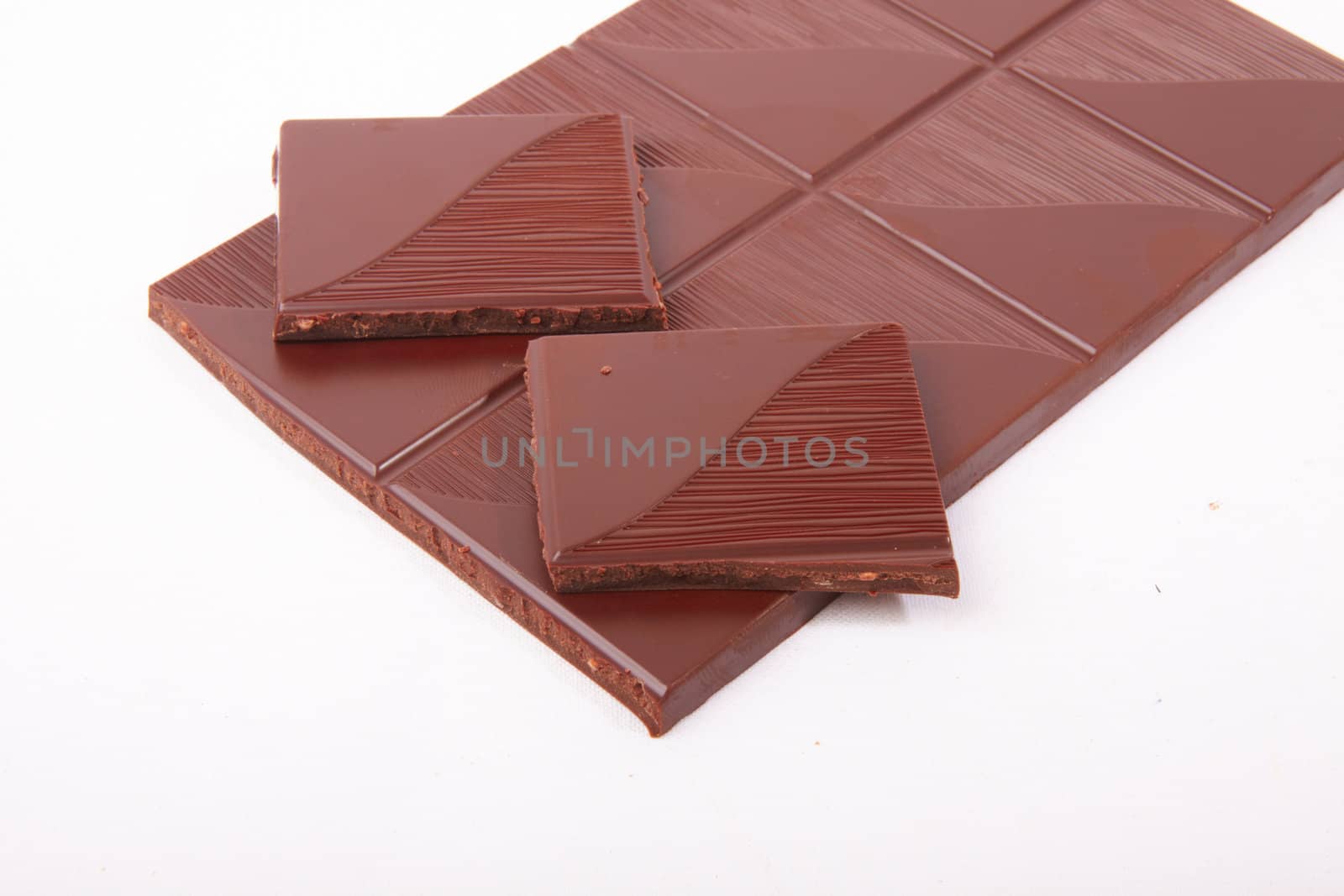 stick of chocolate  over white background