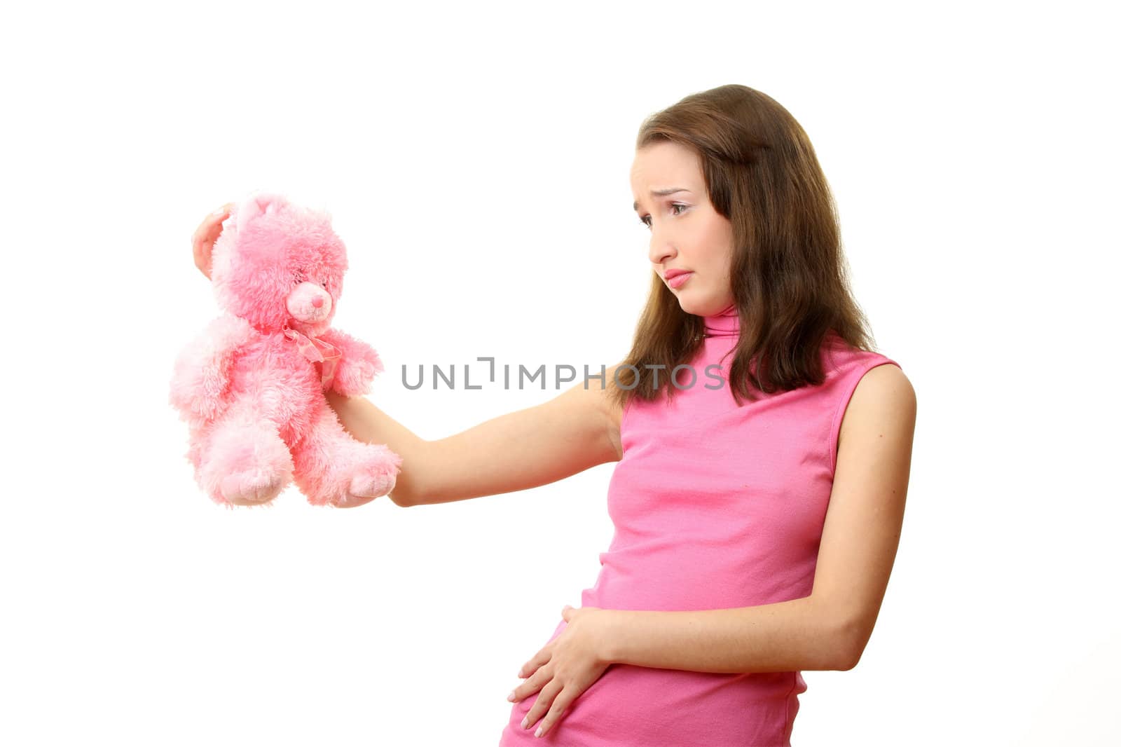 The girl with a pink teddy bear