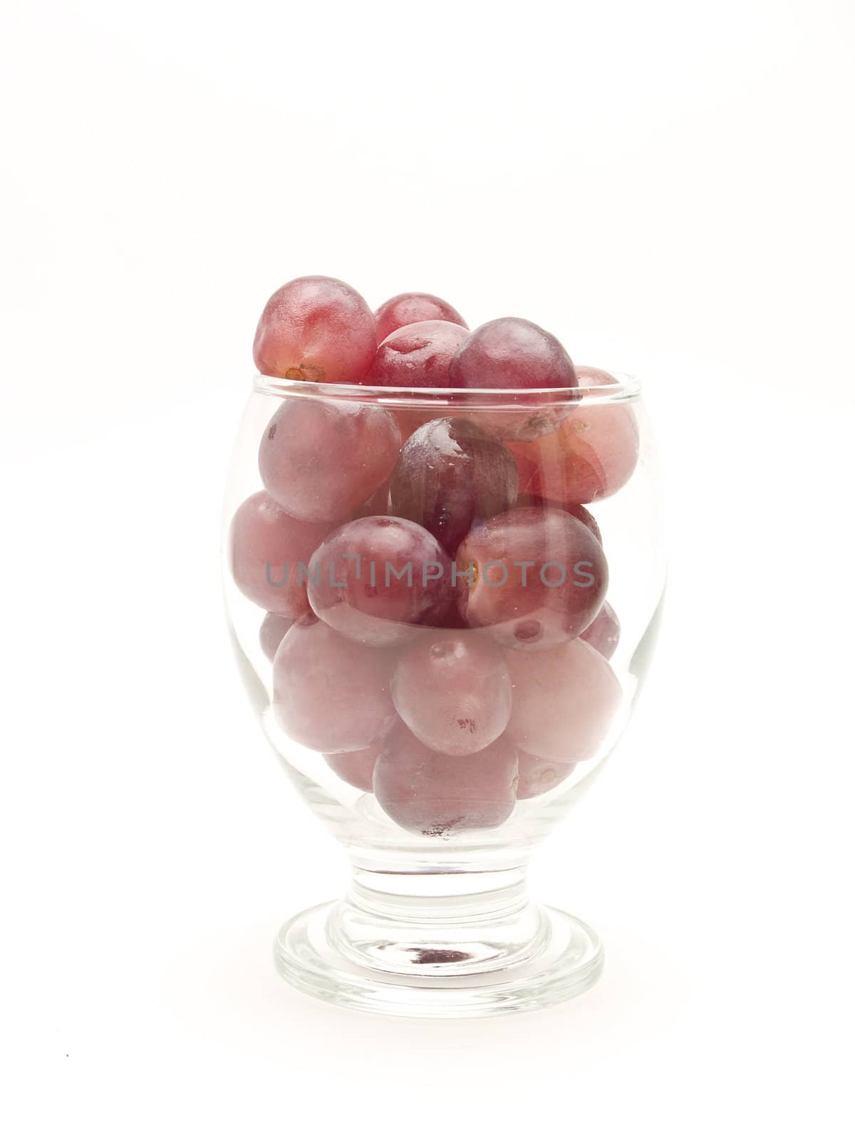  glass with grapes by lauria