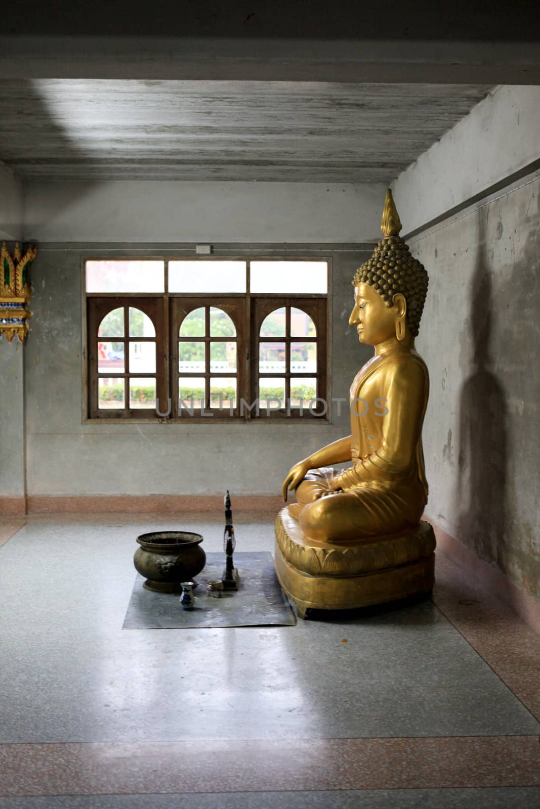 Buddha statue inside a temple in Khao Lak, Thailand - travel and tourism.