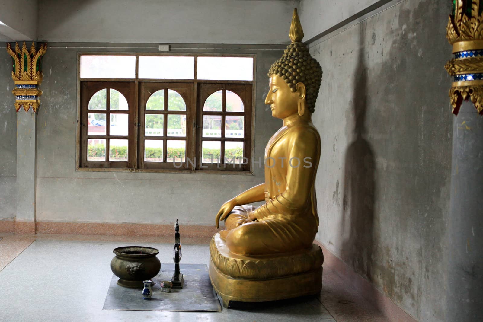 Buddha statue inside a temple in Khao Lak, Thailand - travel and tourism.