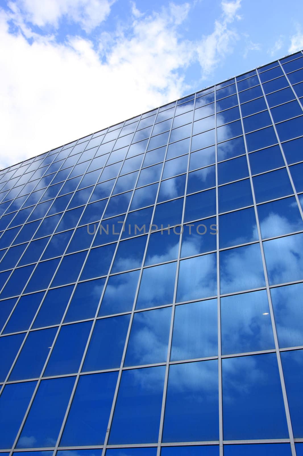 Facade of a modern building from glass and a steel