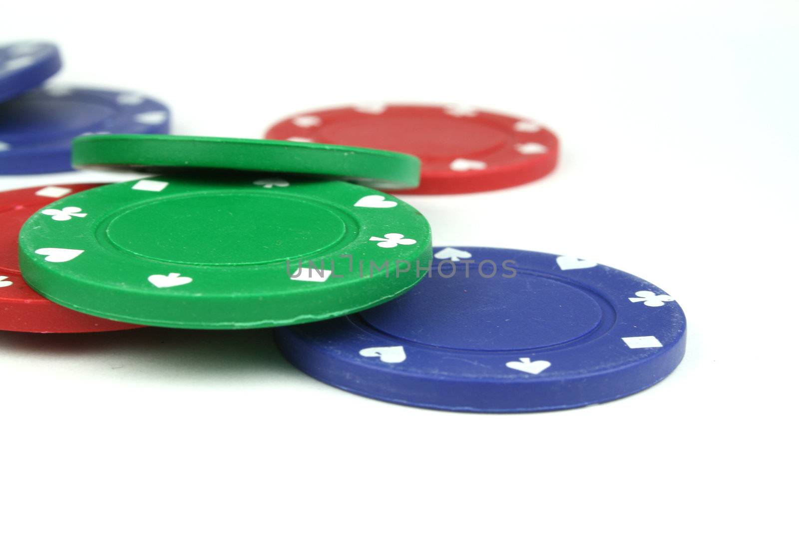 stacks of poker chips isolated overwhite