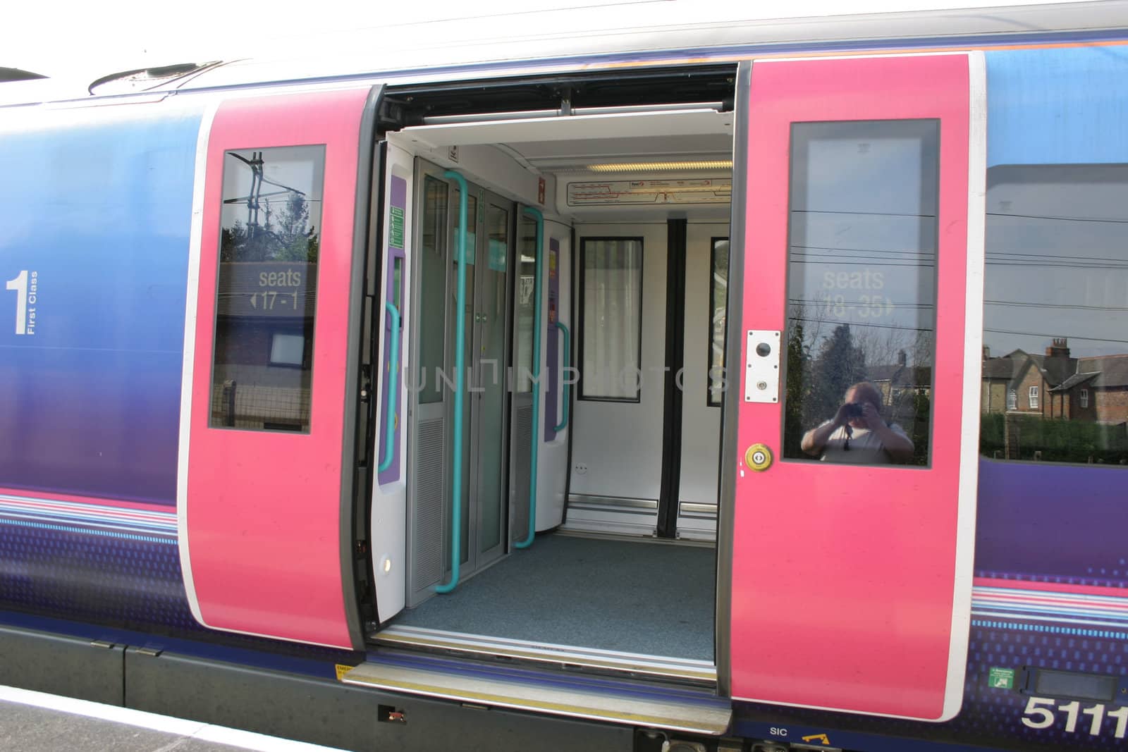 modern train carriage with the sliding doors open