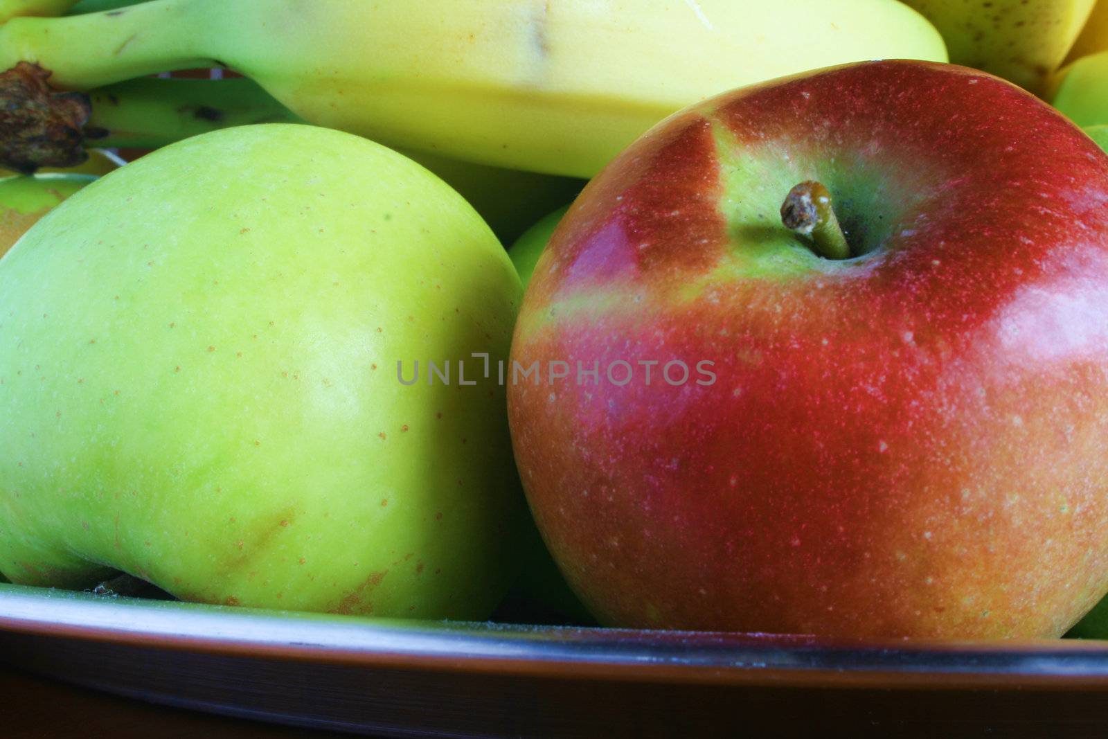fresh fruit on a silver tray using natural light