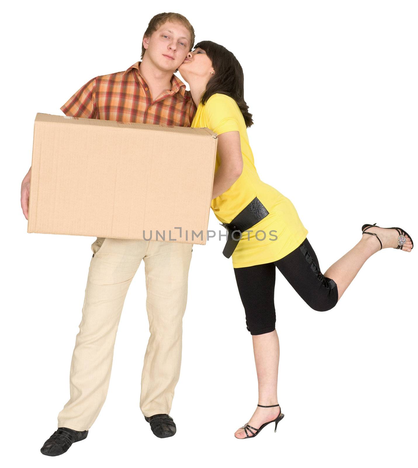 Young woman kissing man on the white background